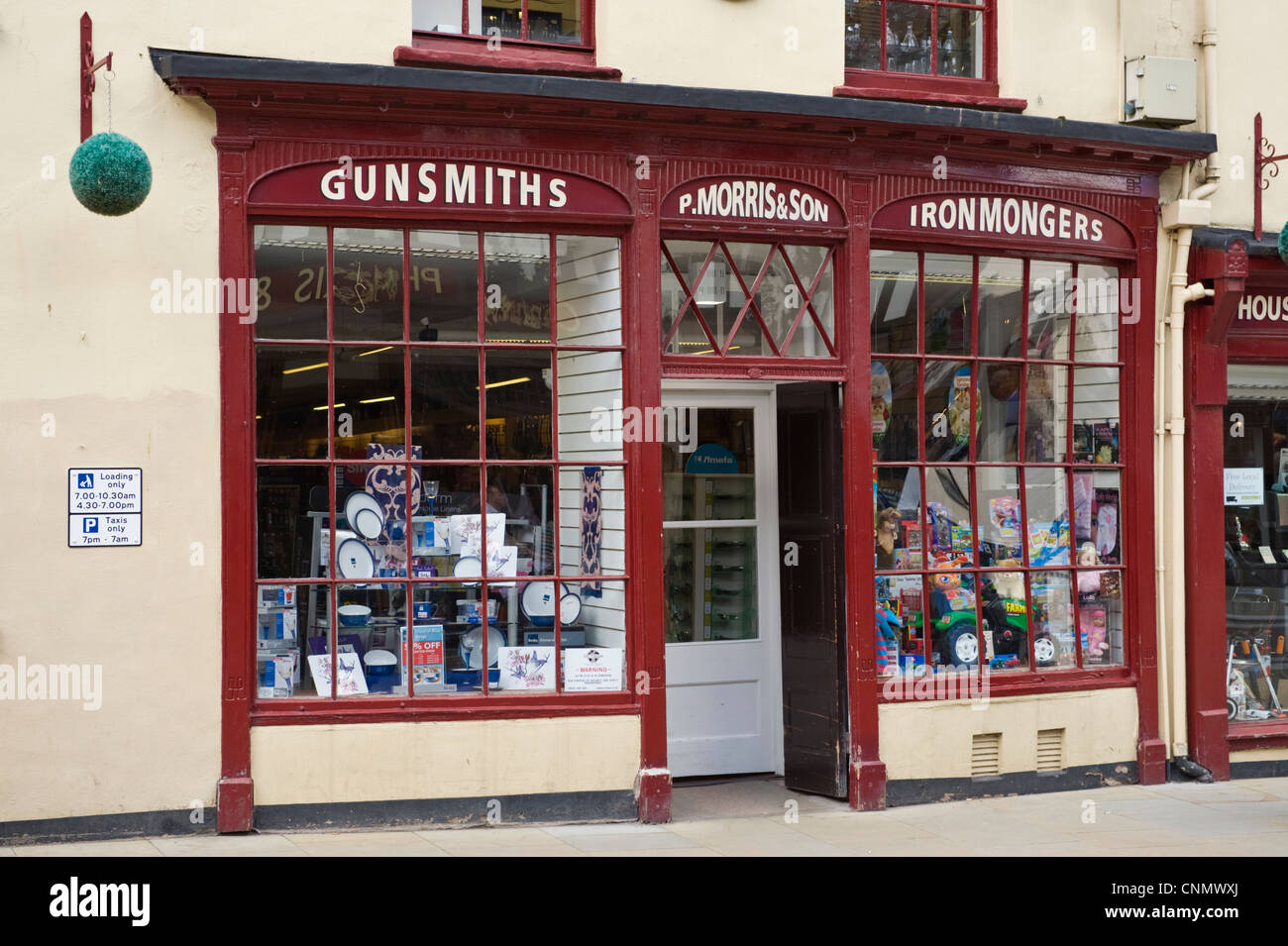 Exterior of traditional ironmongers and gunsmiths in city centre of Hereford Herefordshire England UK Stock Photo