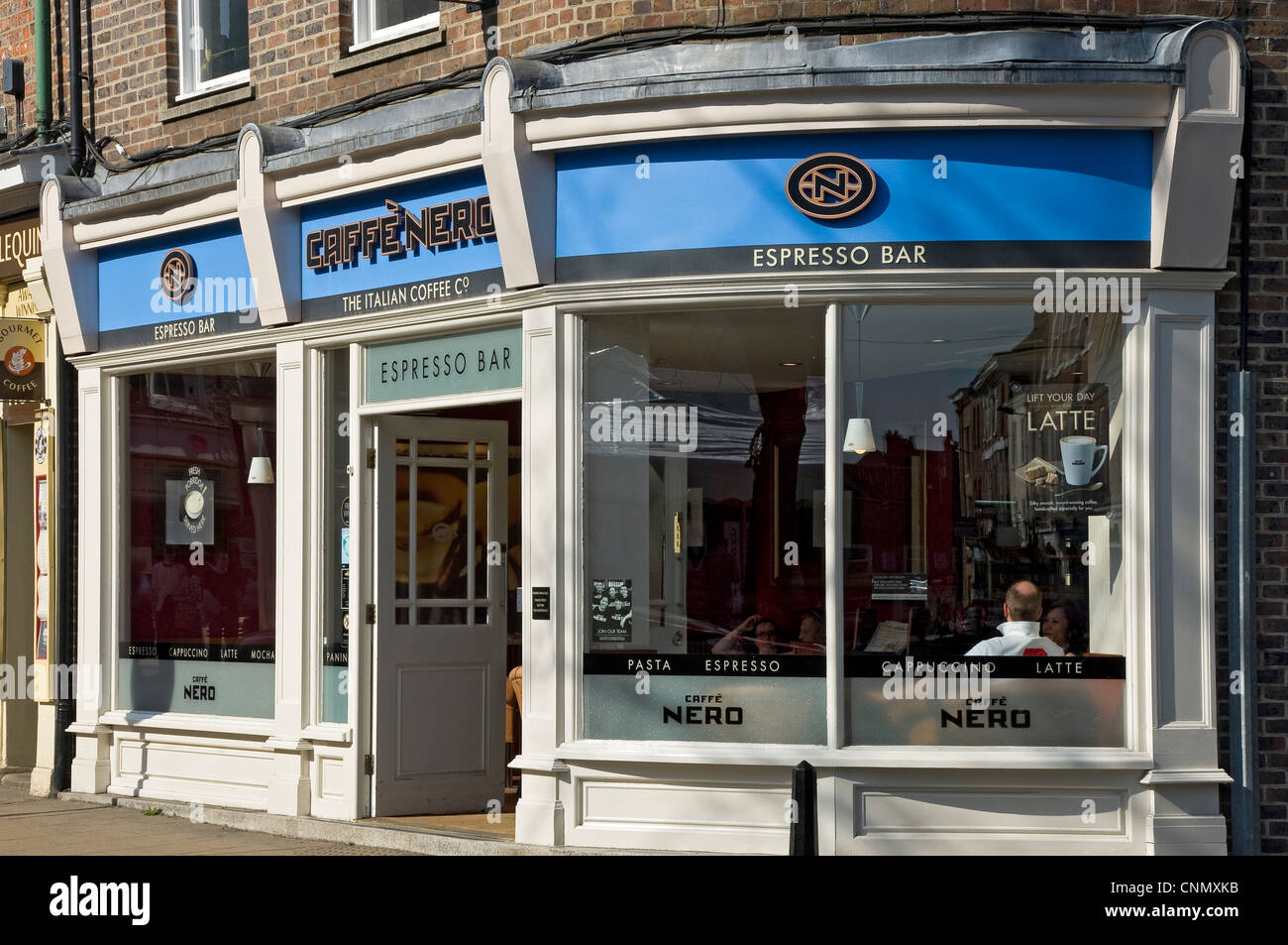 Cafe Caffe Nero coffee shop store entrance exterior shopfront in the town city centre York North Yorkshire England UK United Kingdom GB Great Britain Stock Photo
