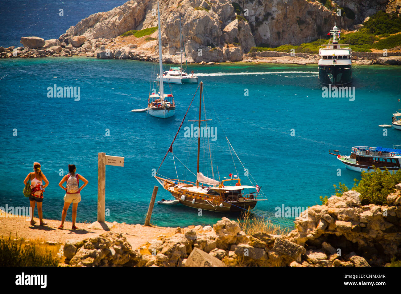 Bay and sailing ships in Knidos ancient Greek city ruins. Datca