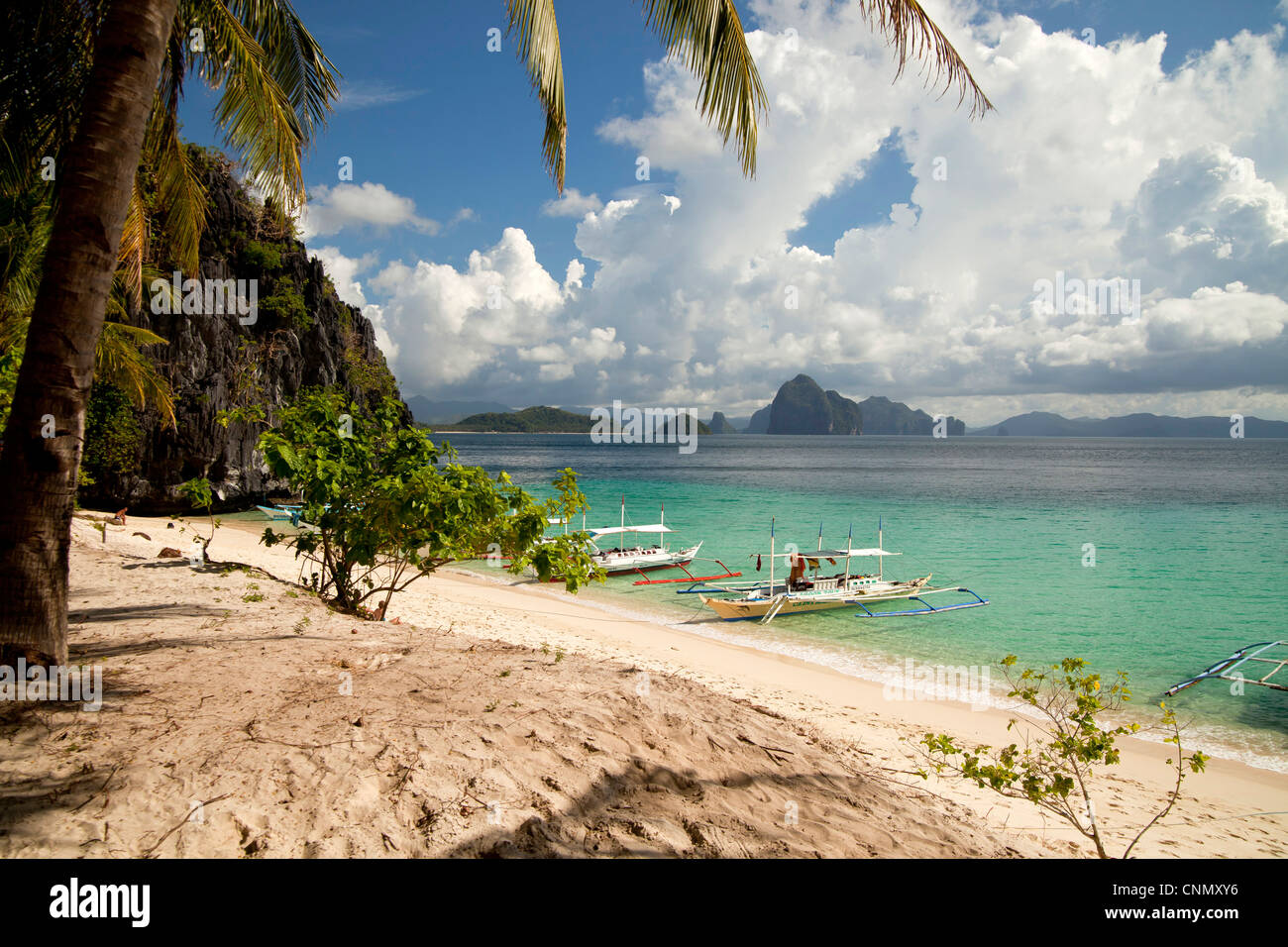 outrigger boats at Seven Commando Beach near El Nido, Palawan, Philippines, Asia Stock Photo