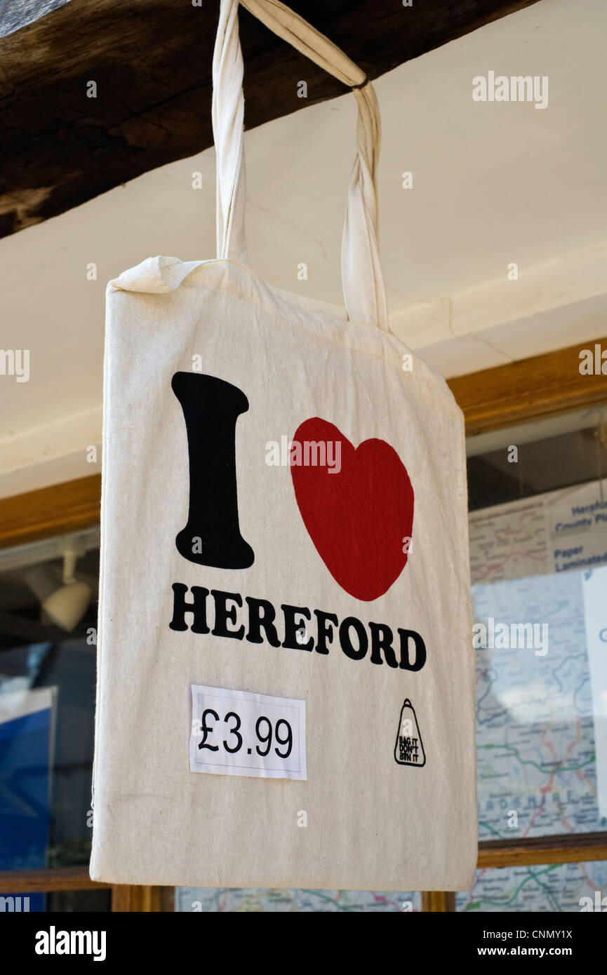 I LOVE HEREFORD bag hanging outside shop in city centre of Hereford Herefordshire England UK Stock Photo