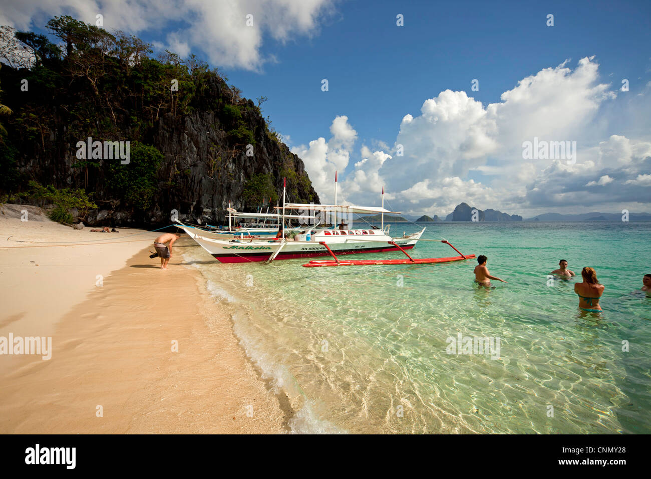 tourists swimming at Seven Commando Beach near El Nido, Palawan, Philippines, Asiatisch, Asian Stock Photo