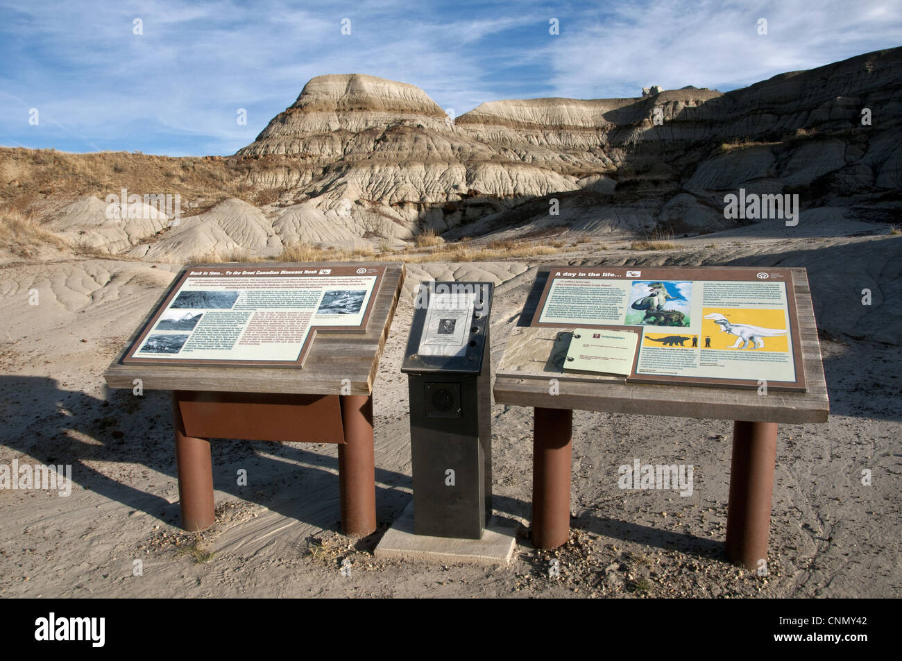 Dinosaur information boards in badlands habitat, Dinosaur Provincial Park, Alberta, Canada, october Stock Photo