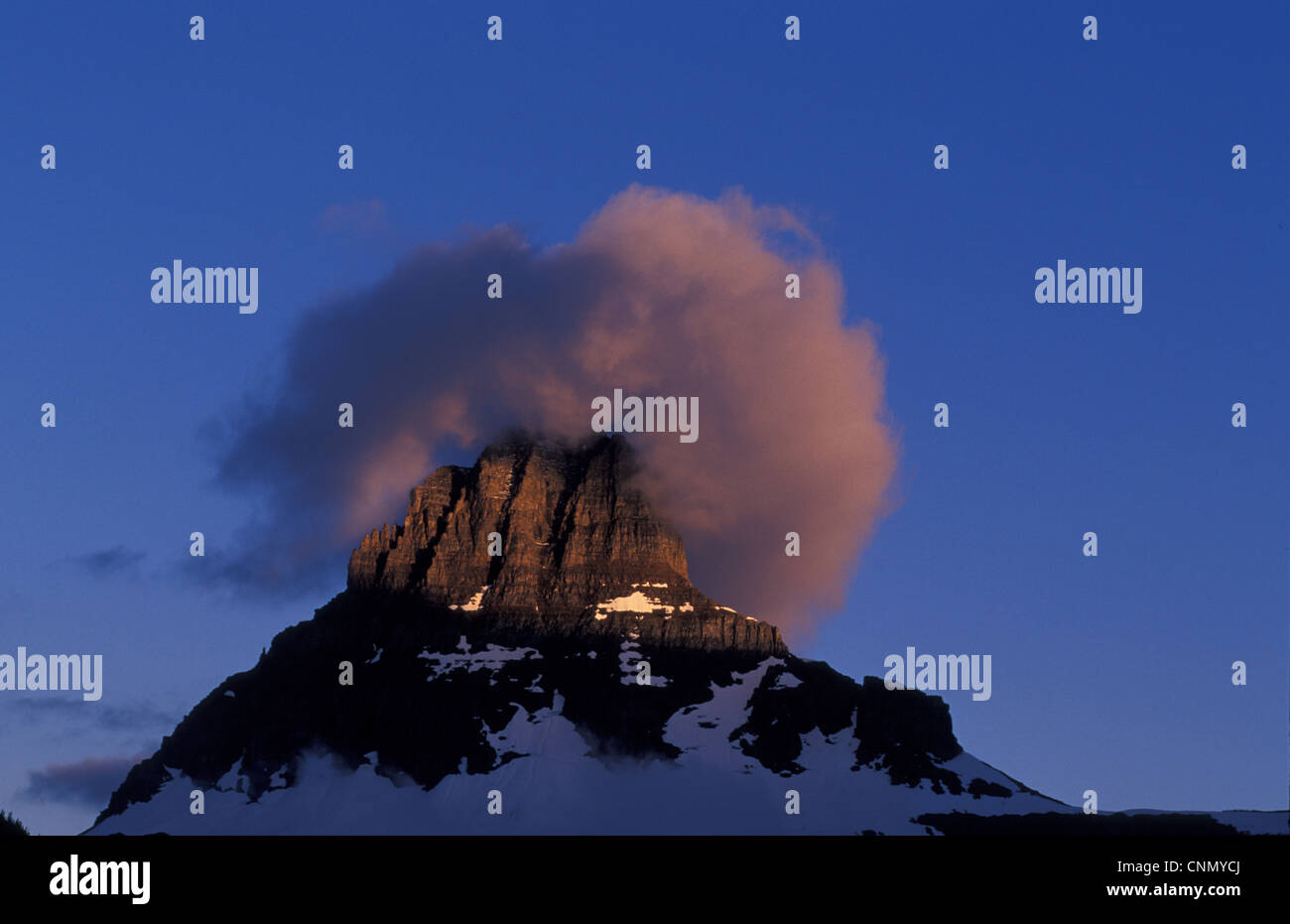 Montana First light hits mountain tops, Logan Pass, Glacier Nat. Pk. Montana, USA. Stock Photo