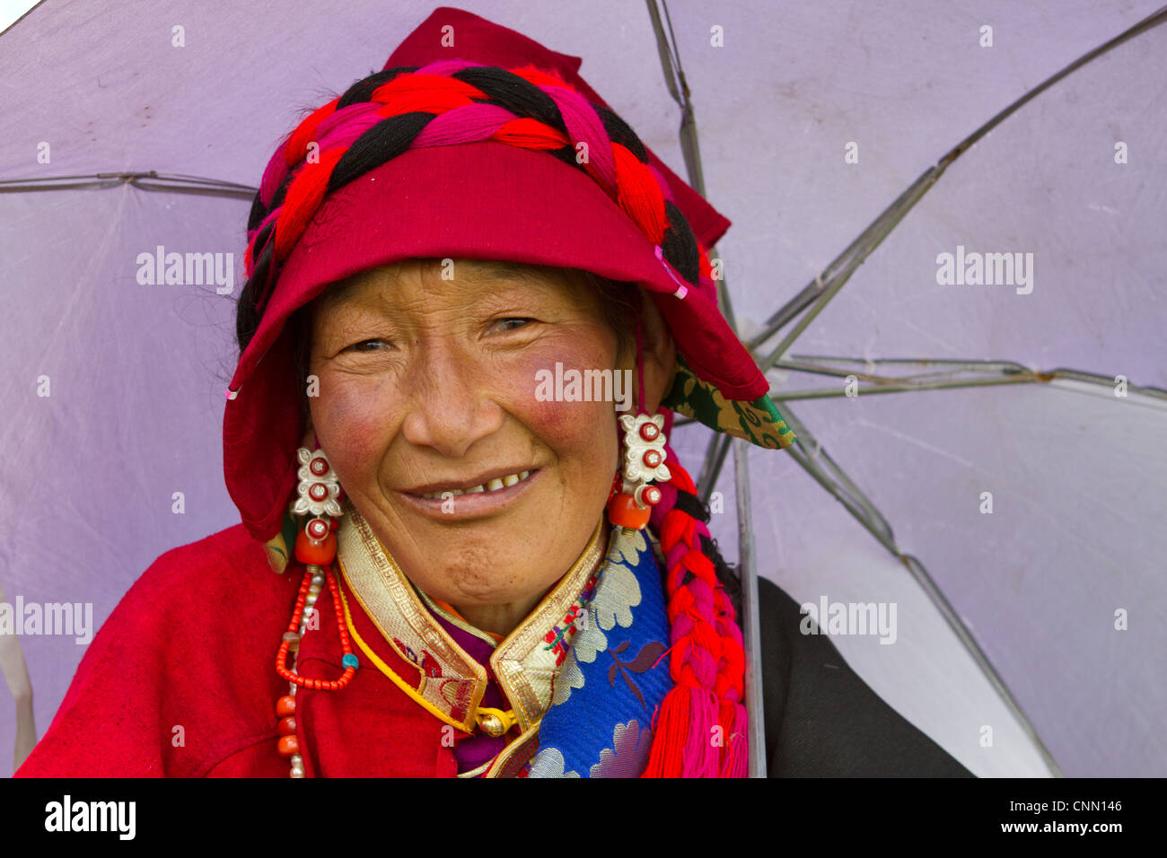 Portrait Nomad woman ceremony horse festival secret mountain Tagong area western China Tibet Asia Stock Photo