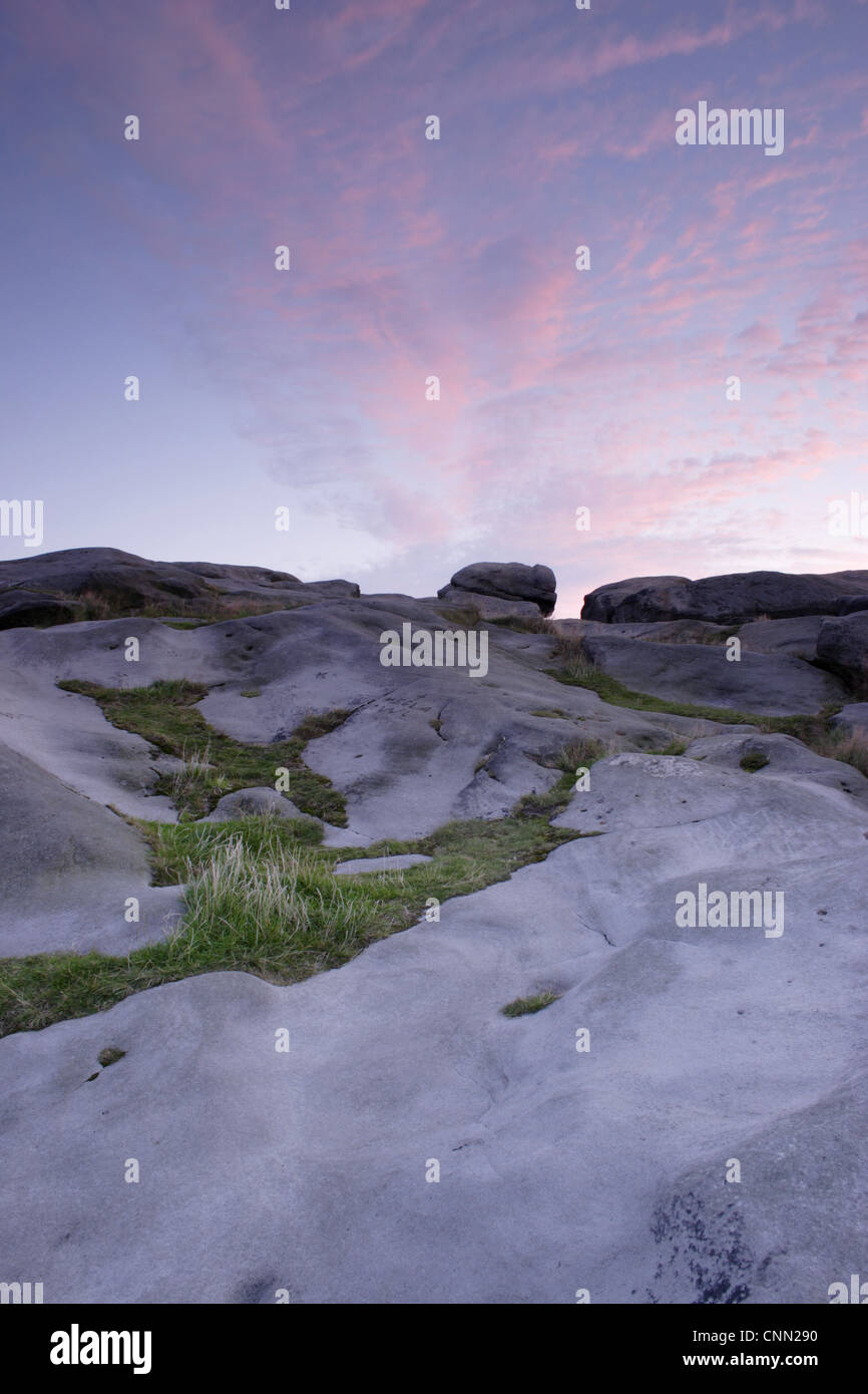 Gritstone rocks at twilight, Almscliff Crag rock formation, North Rigton, North Yorkshire, England, august Stock Photo