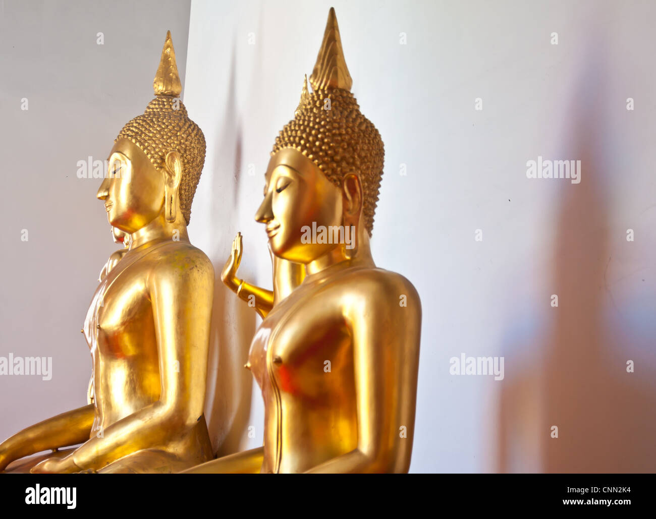 golden Buddha statue in the temple Stock Photo - Alamy