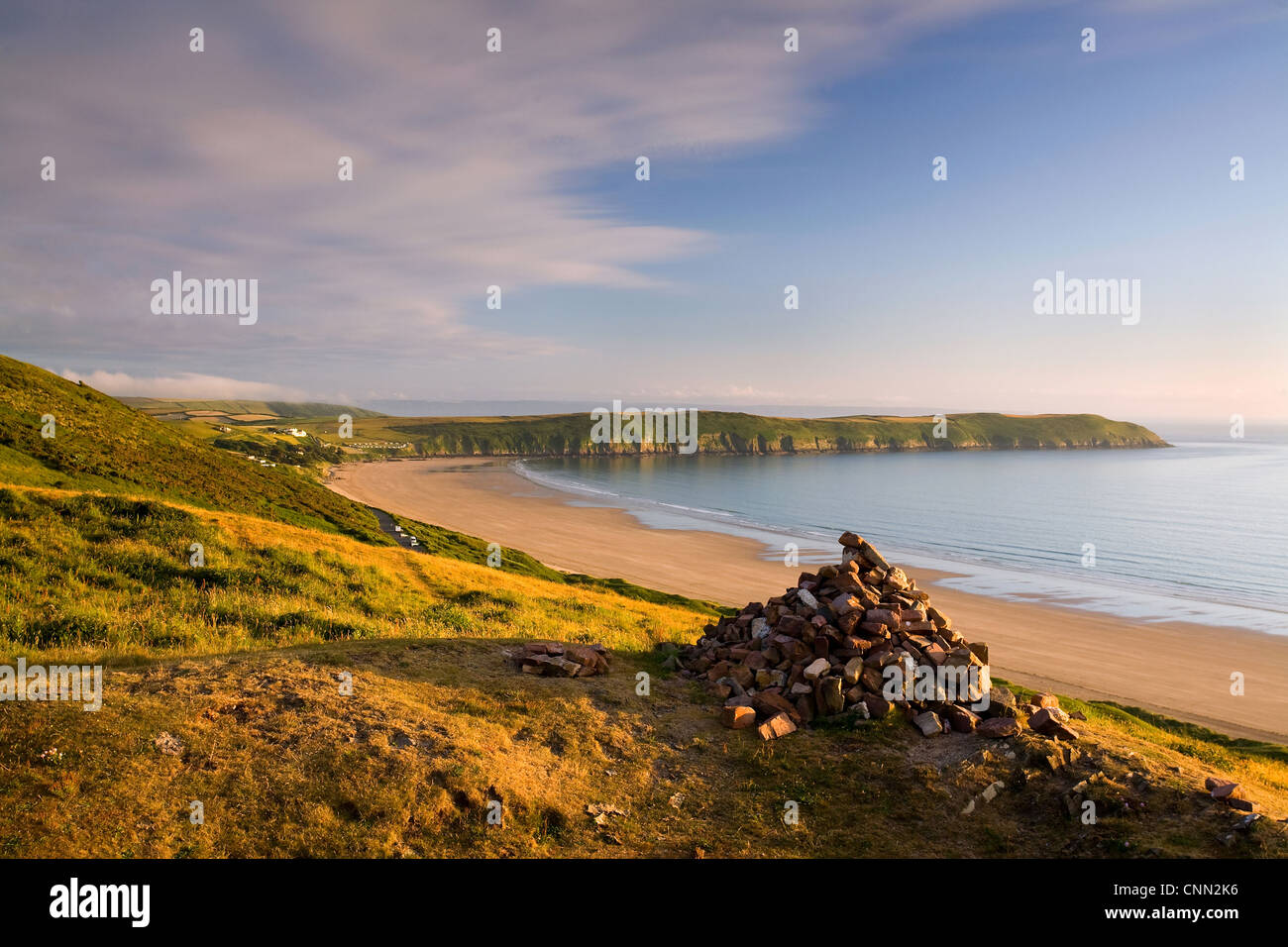 View coastline headland sunset viewed Potters Hill Baggy Point jutting out Bristol Channel Putsborough Beach North Devon Stock Photo