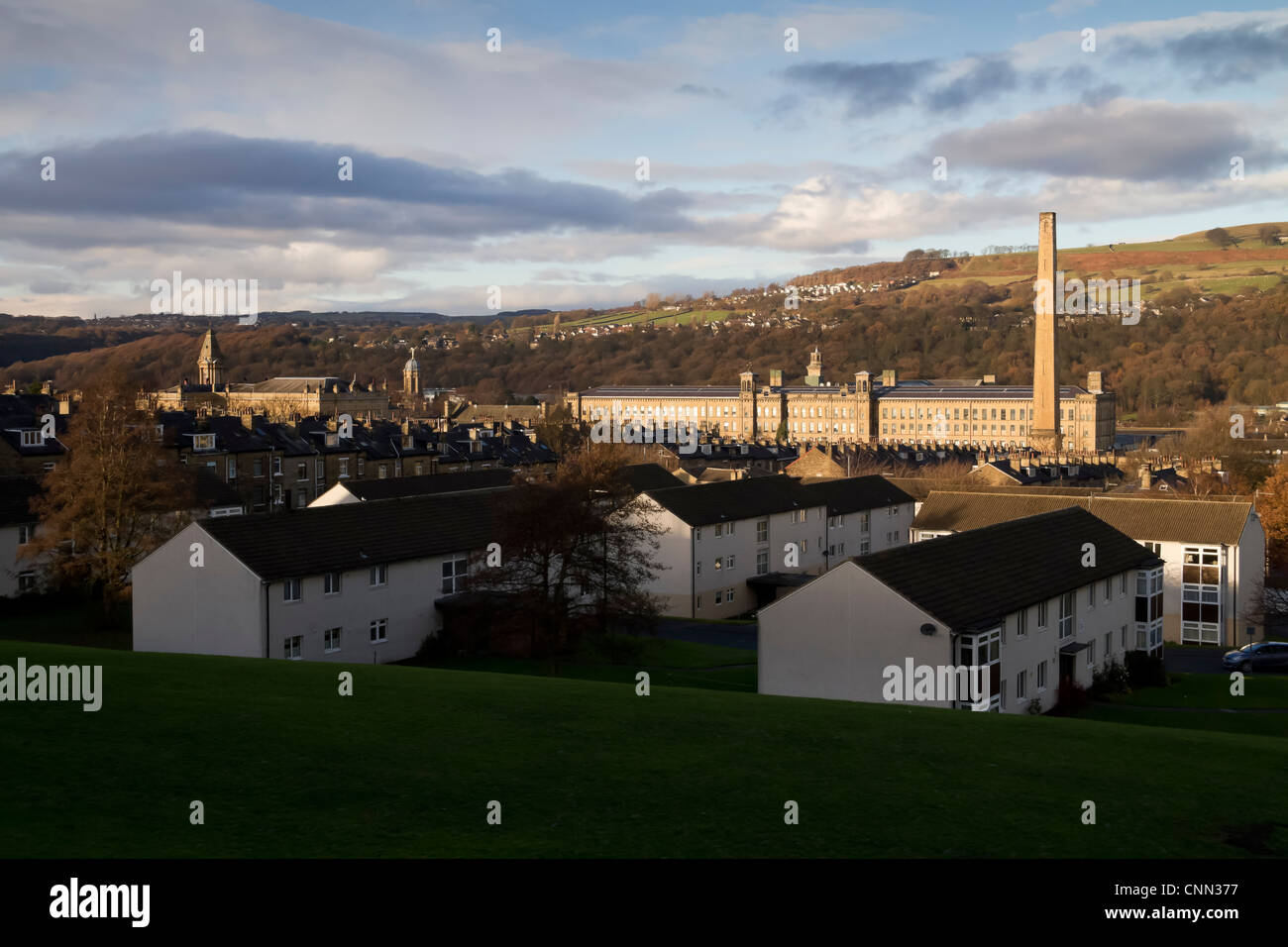 Salts Mill in Saltaire, looking down from Shipley, showing rows of terraced houses leading to the Mill. Stock Photo