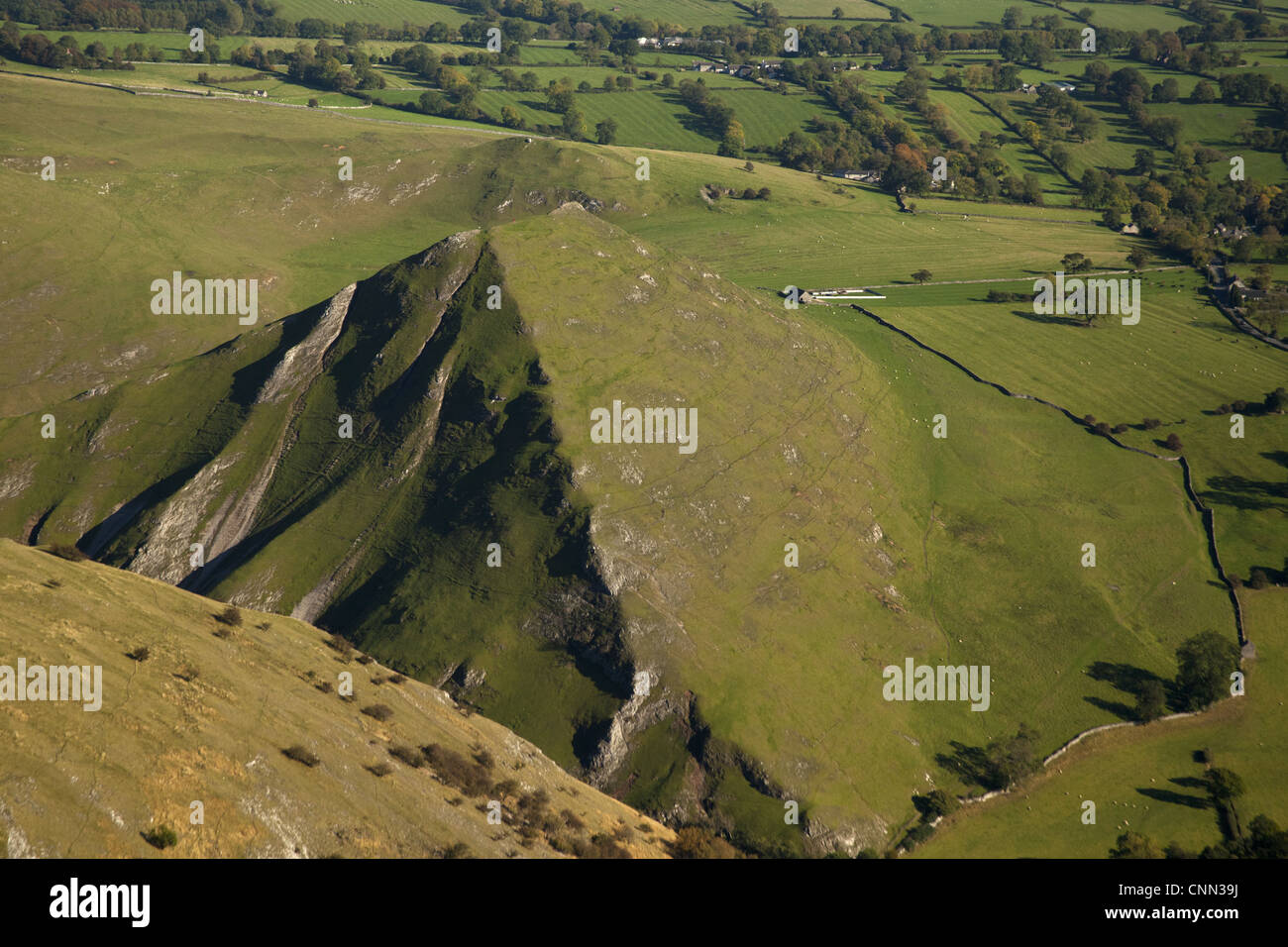 Aerial view of isolated limestone hill, Thorpe Cloud, White Peak, Peak