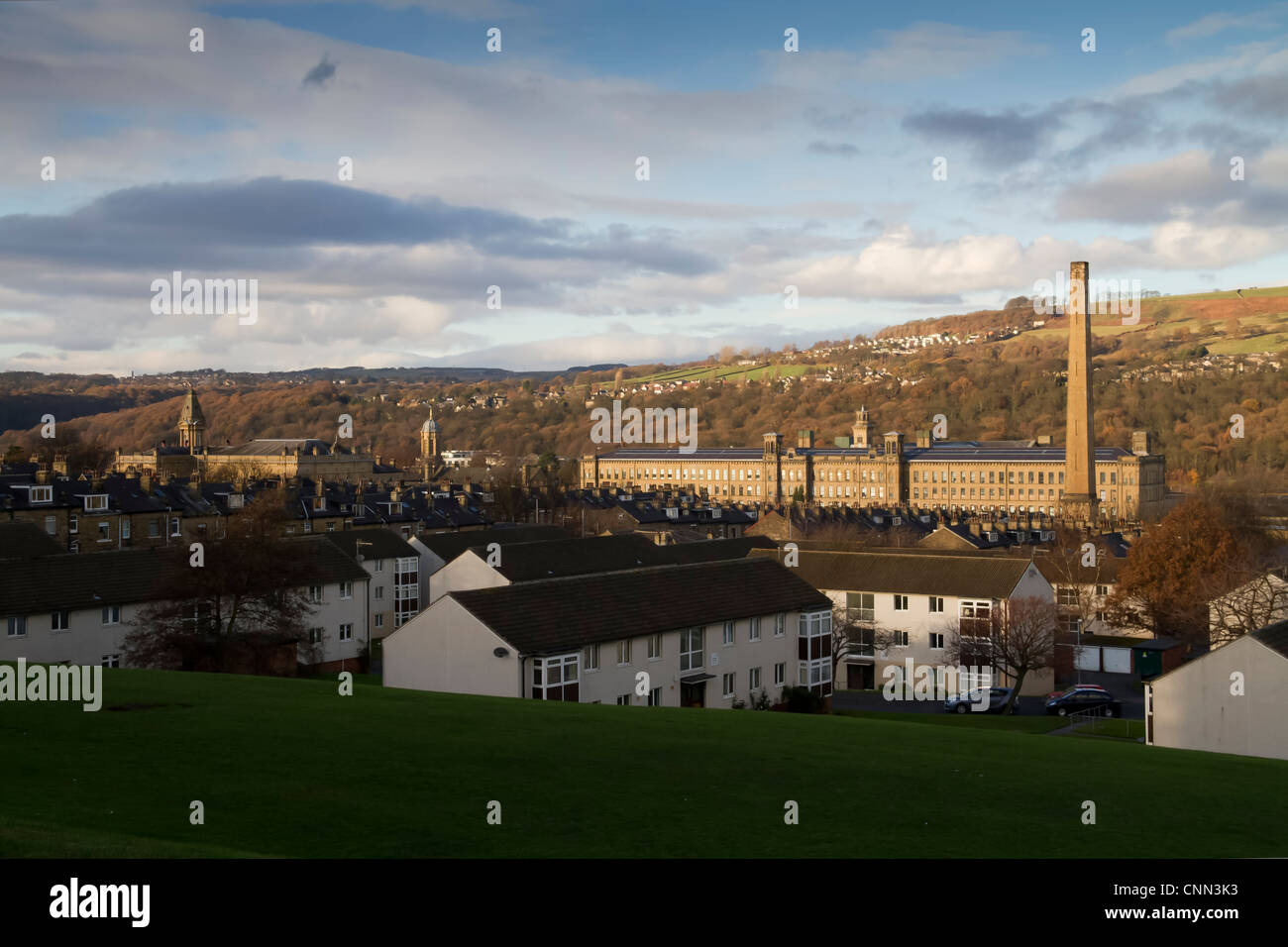 Salts Mill in Saltaire, looking down from Shipley, showing rows of terraced houses leading to the Mill. Stock Photo