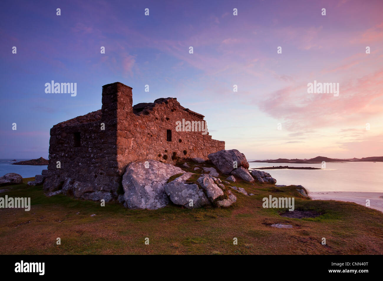 16th century fort built defend harbour sunrise Blockhouse Block Point between Green Porth Cook's Porth Old Grimsby Tresco Isles Stock Photo