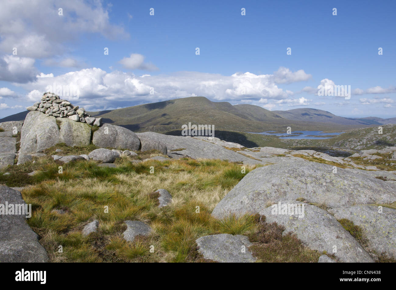 View of upland habitat with loch, Merrick and Loch Enoch from Craignaw, Galloway Hills, Dumfries and Galloway, Scotland, august Stock Photo