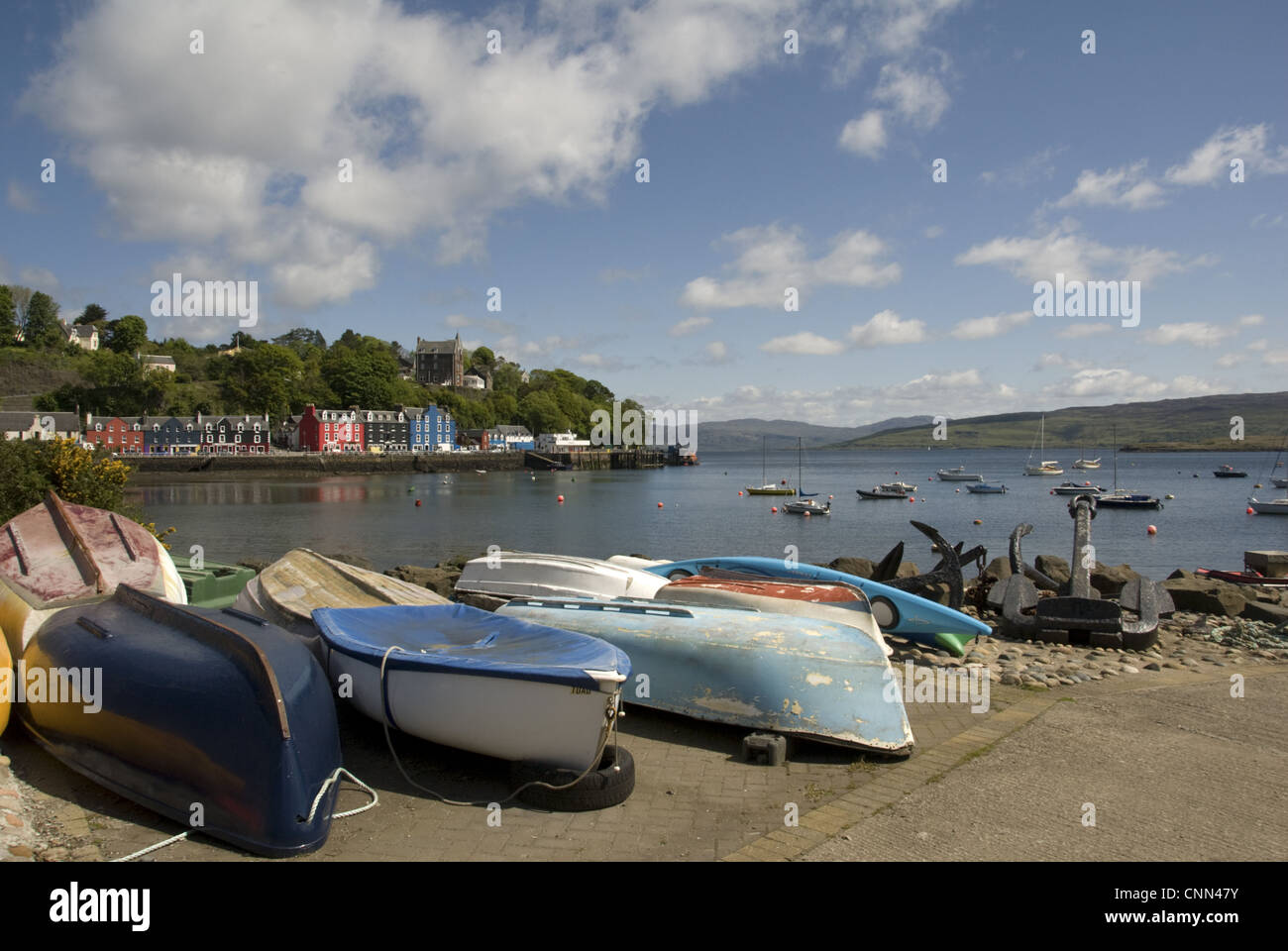 View of boats and anchors on waterfront of coastal town, Tobermory, Tobermory Bay, Isle of Mull, Inner Hebrides, Scotland, may Stock Photo