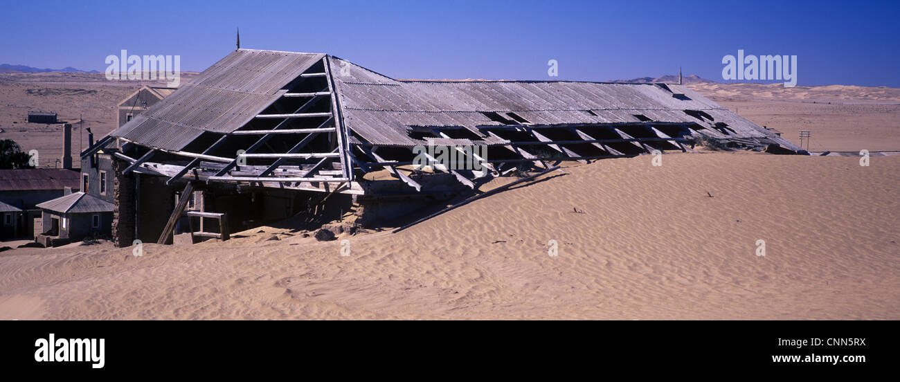 Namibia Sand encroaching on buildings of abandon diamond mining town of Kolmanskop, Namibia Stock Photo