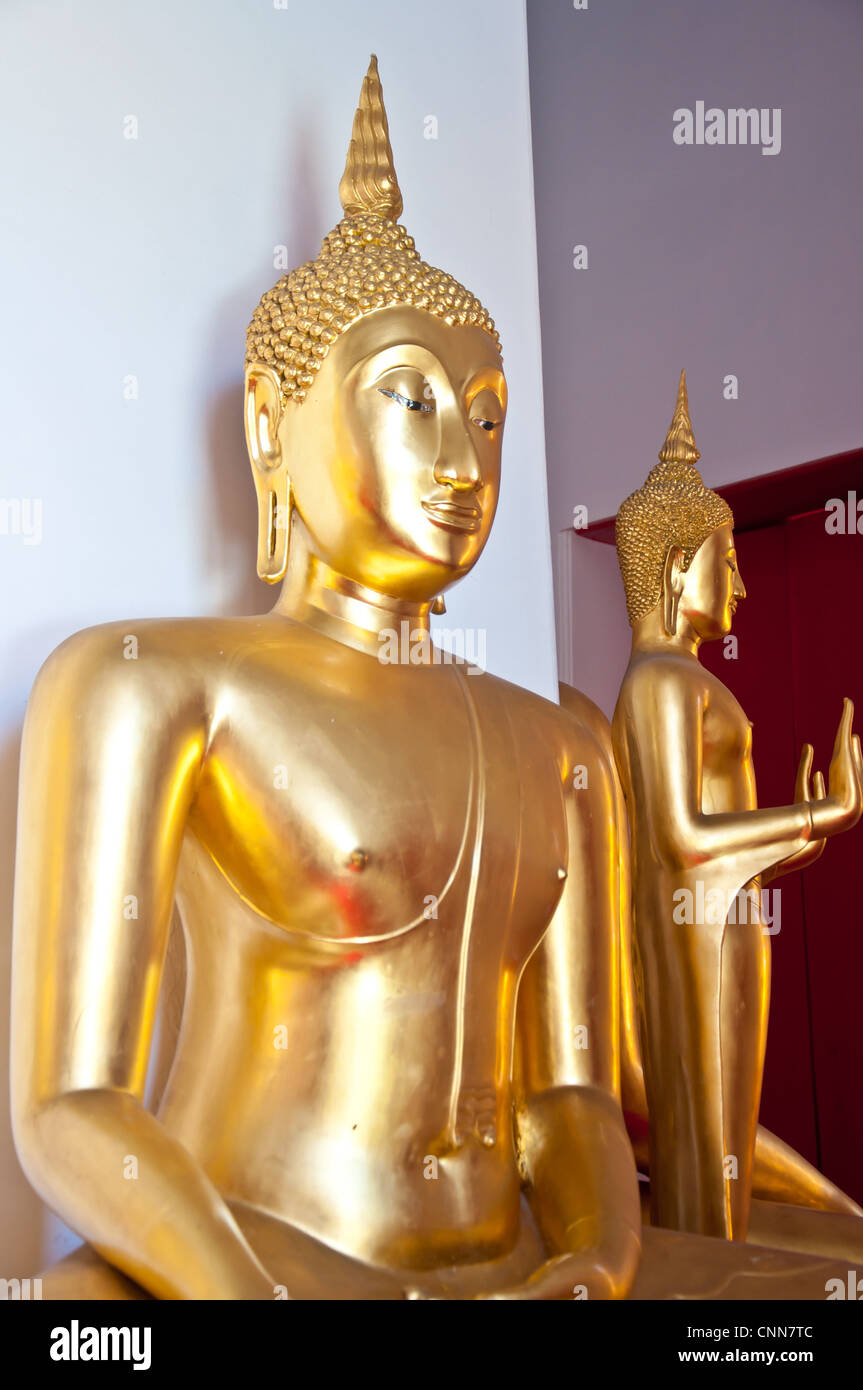 golden Buddha statue in the temple Stock Photo - Alamy