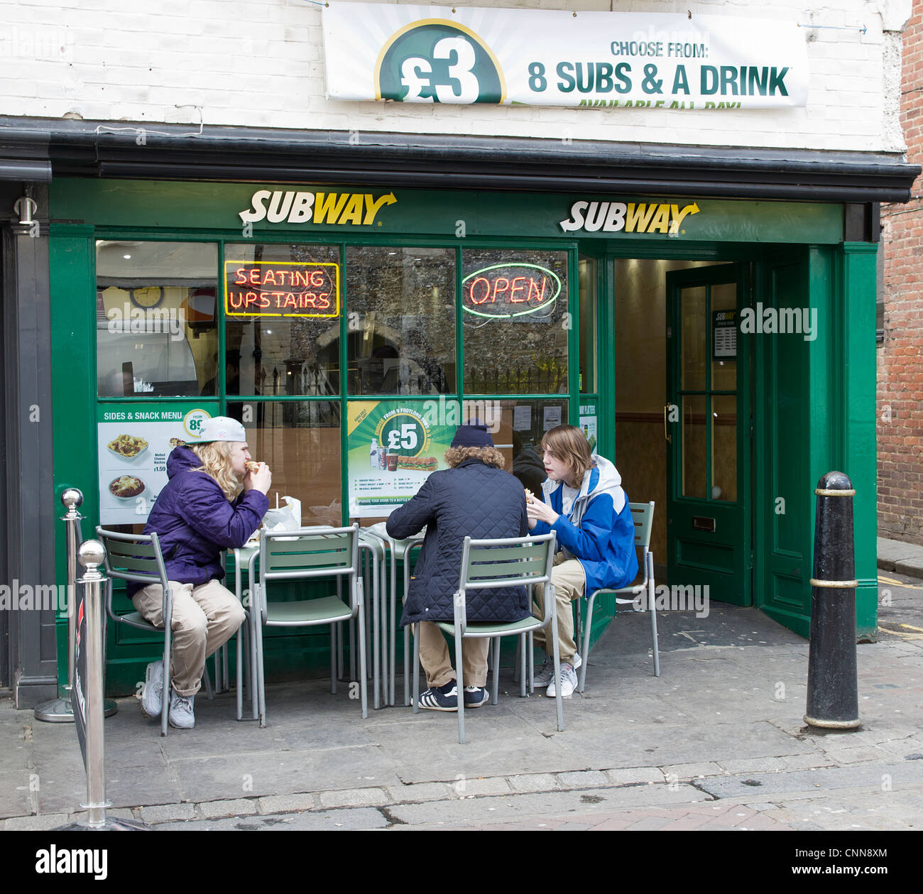 Subway. Youths Boys eating outside Canterbury UK Stock Photo