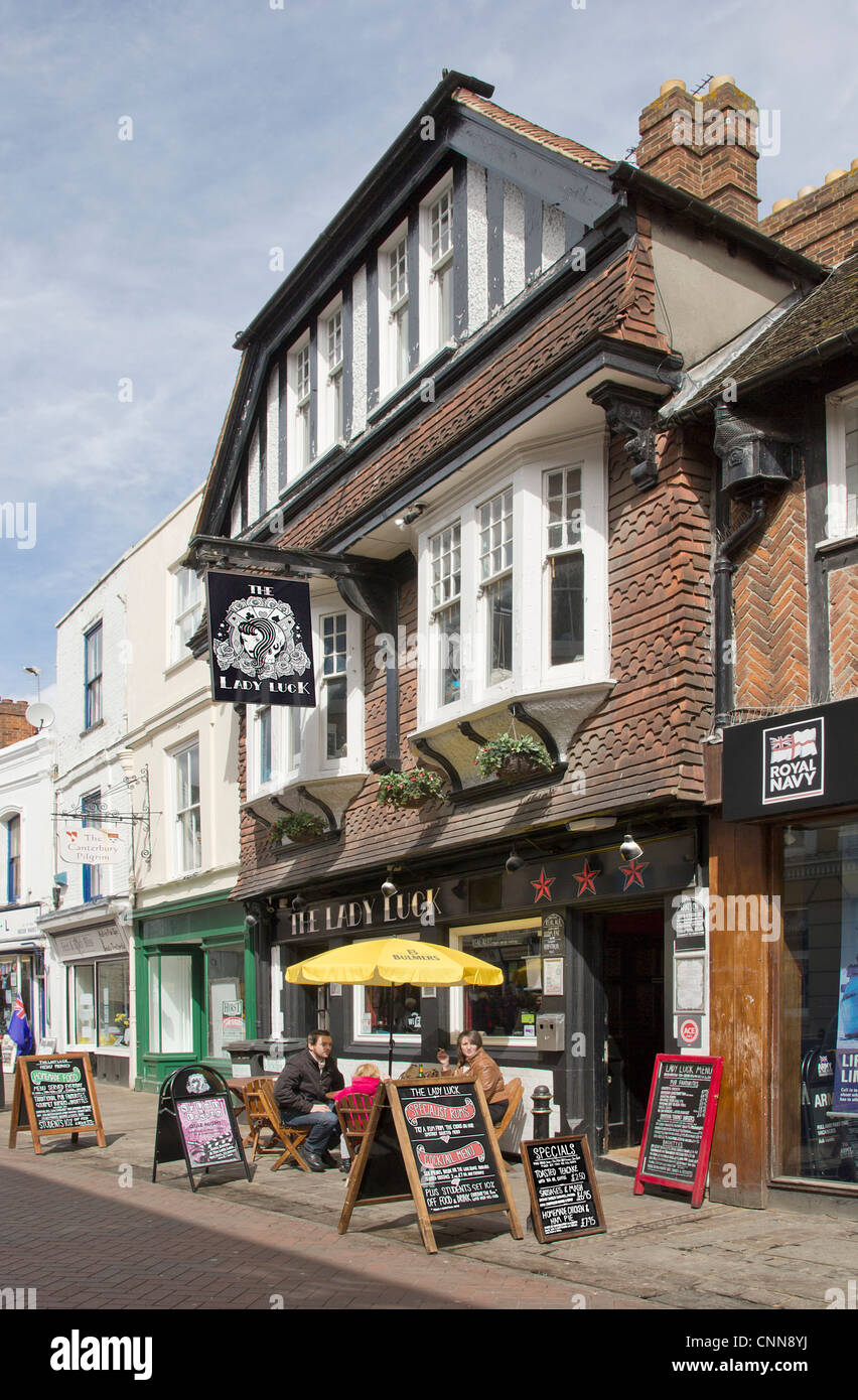 High Street Pub with Family sitting outside. Canterbury UK Stock Photo