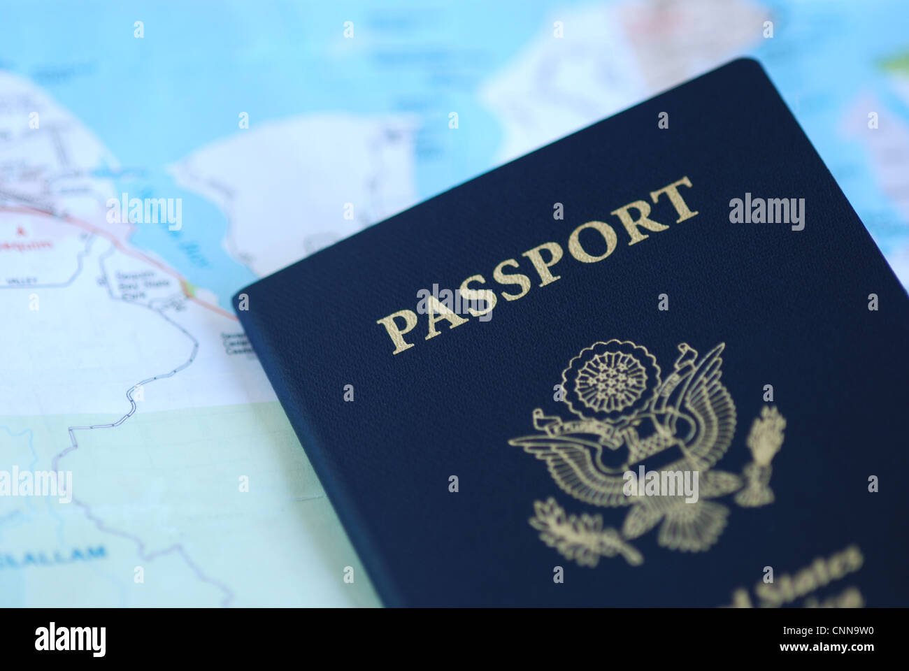 United States Passport on a paper map Stock Photo