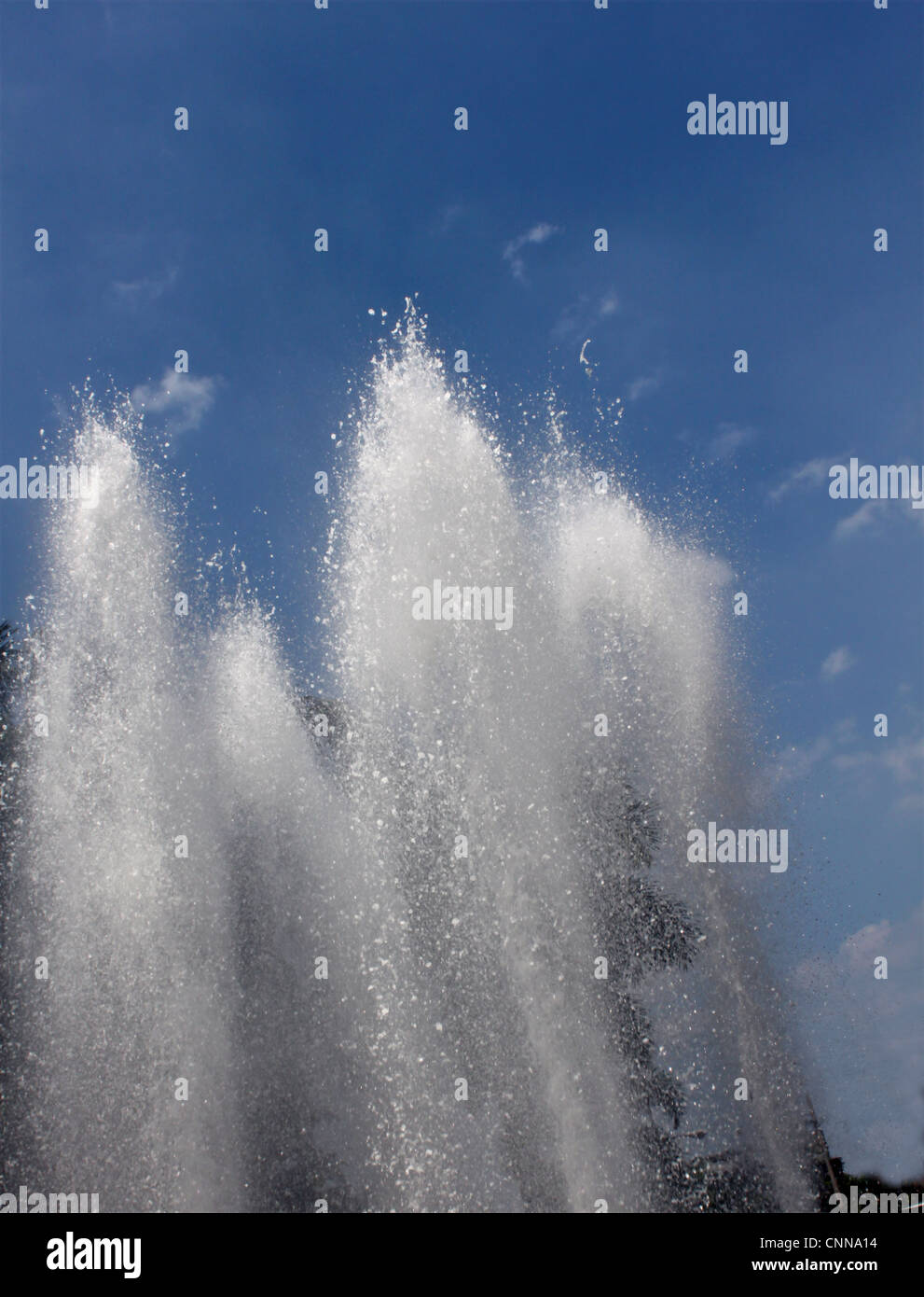 Water fountain in a public park in the city Stock Photo - Alamy