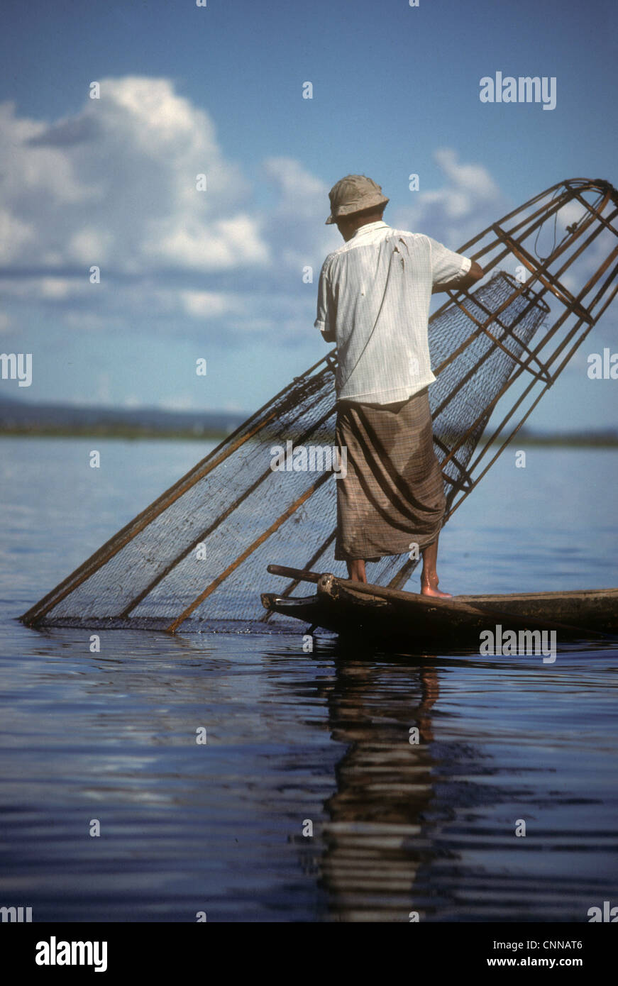 Leg rowing fisherman and fish trap on Inle Lake Burma Stock Photo Alamy