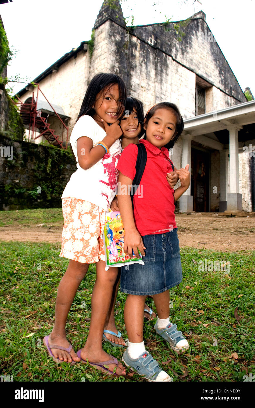 philippines, siquijor island, kids in front of maria church Stock Photo