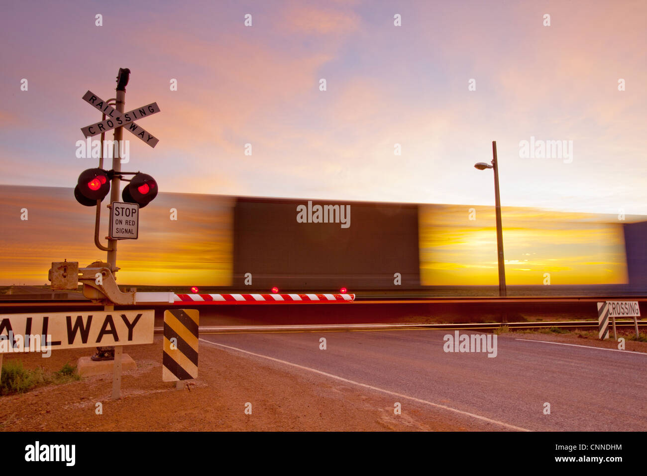 Train crossing at Pimba South Australia Stock Photo