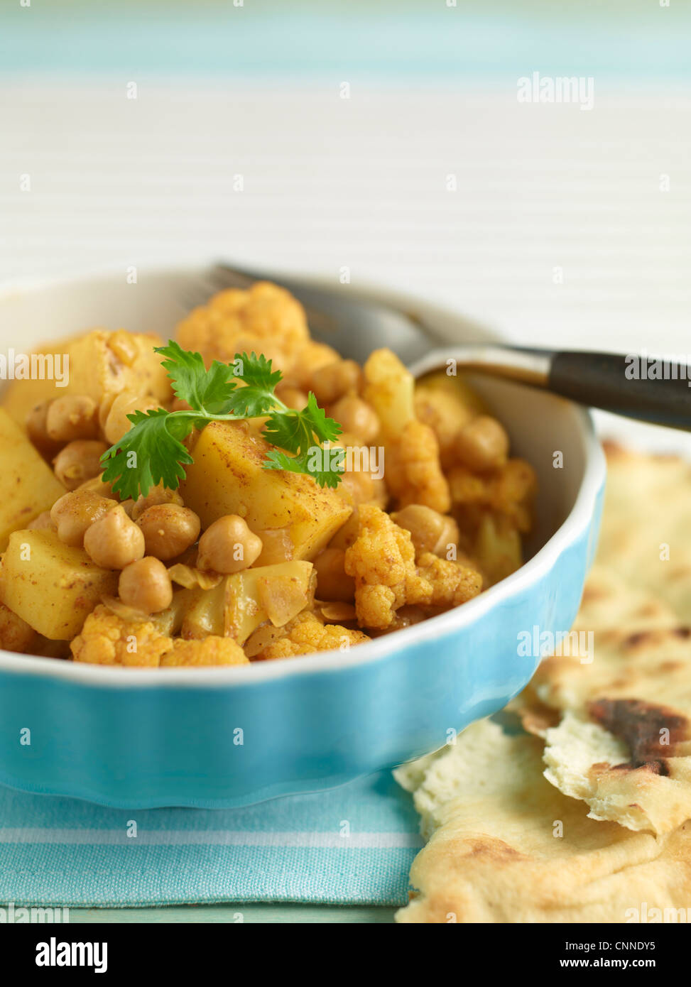 Chickpea Curry with Naan Stock Photo Alamy
