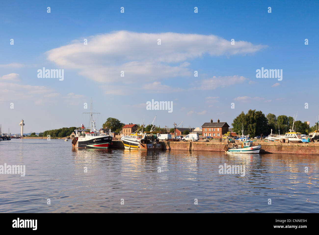 River Seine at Honfleur, Normandy, France, with fishing boats moored along the quay. Stock Photo