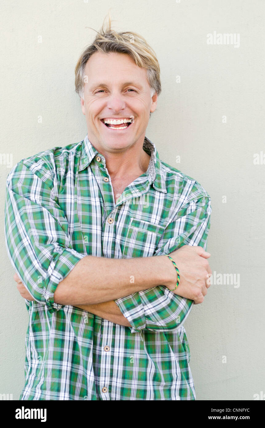 A color portrait photo of a happy laughing man in his forties Stock Photo