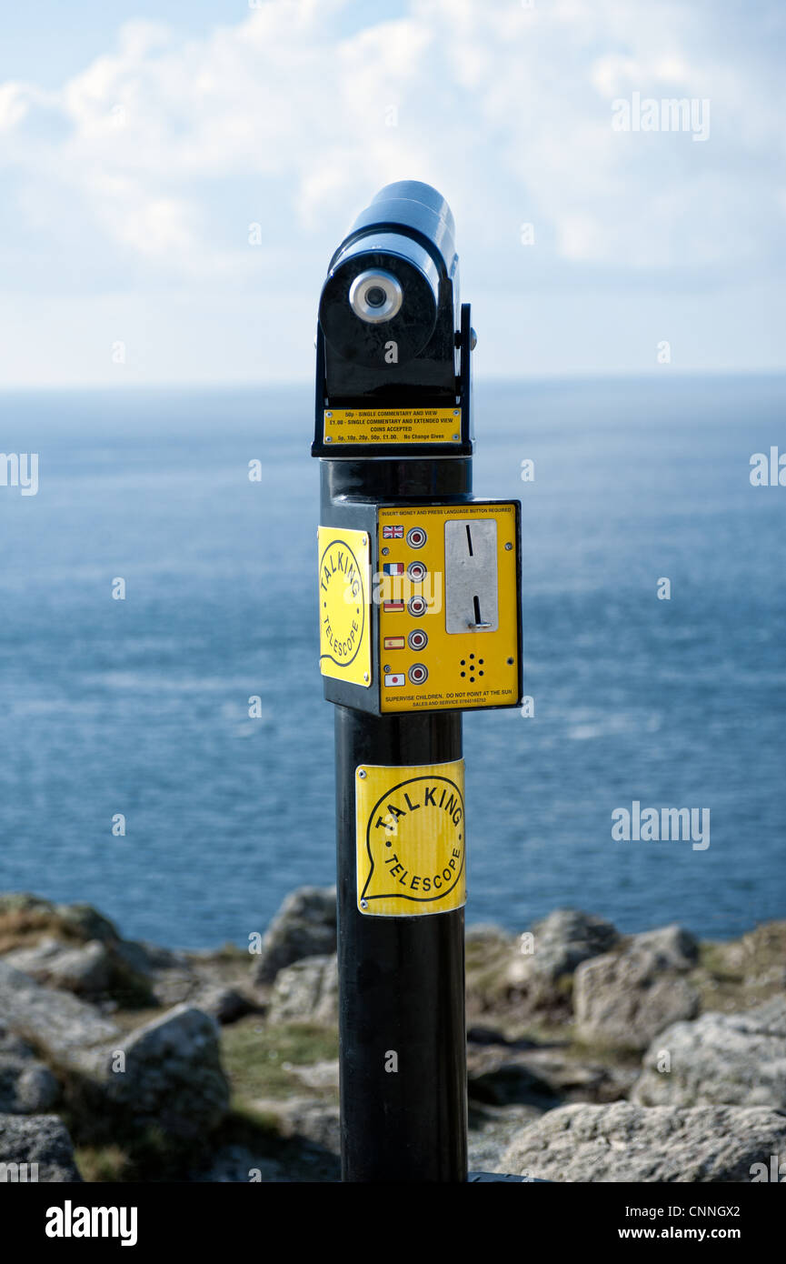 A public pay talking telescope overlooking the sea Stock Photo