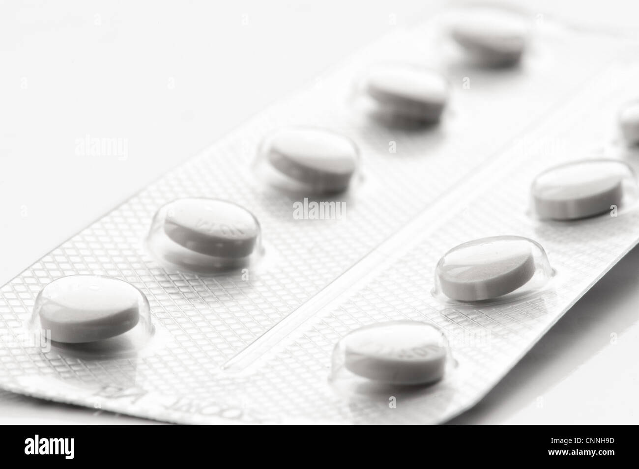 Round white tablets in a blister pack Stock Photo