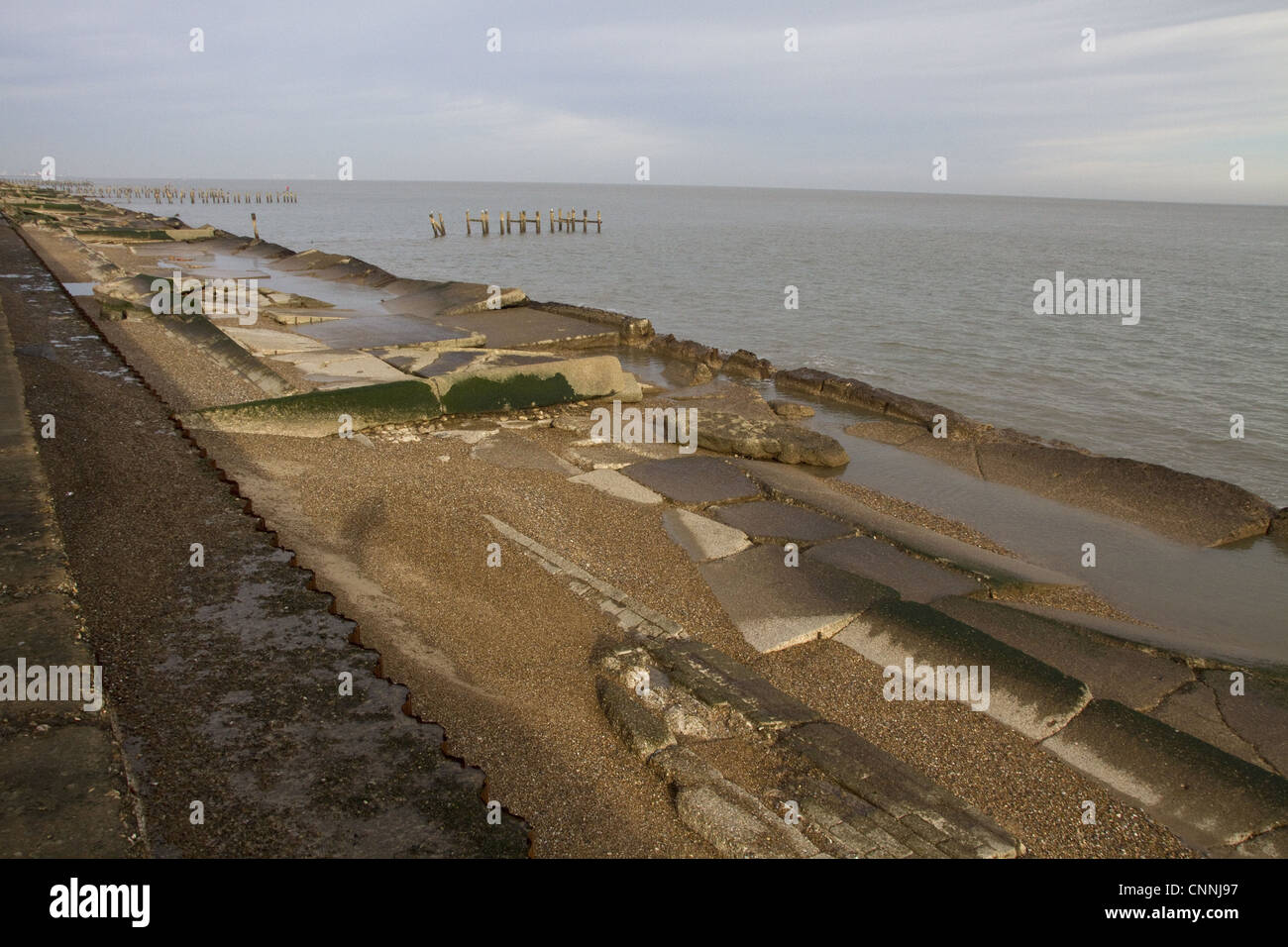 Looking north from Lowestoft Ness over the old sea defence. Stock Photo