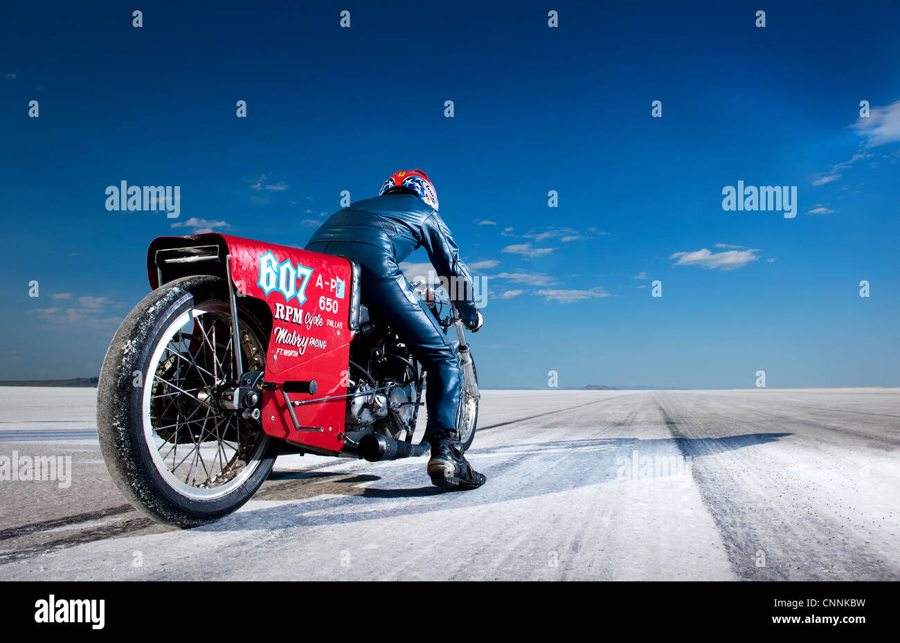 vintage classic red motorbike Bonneville Salt Flats blue sky Stock Photo