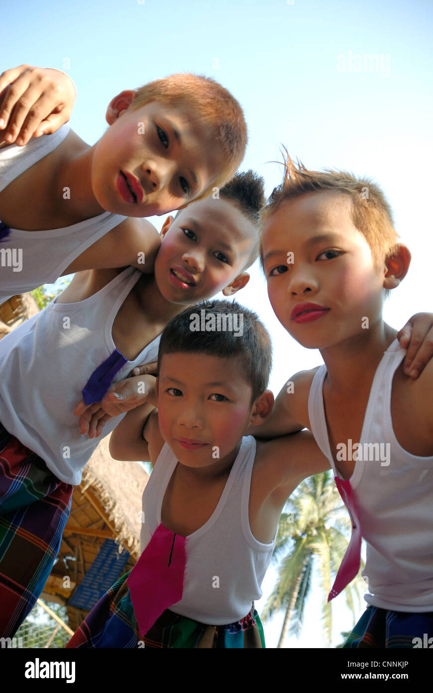 young boys dressed as girls in issan costume for songkhran festival Udonthani Stock Photo