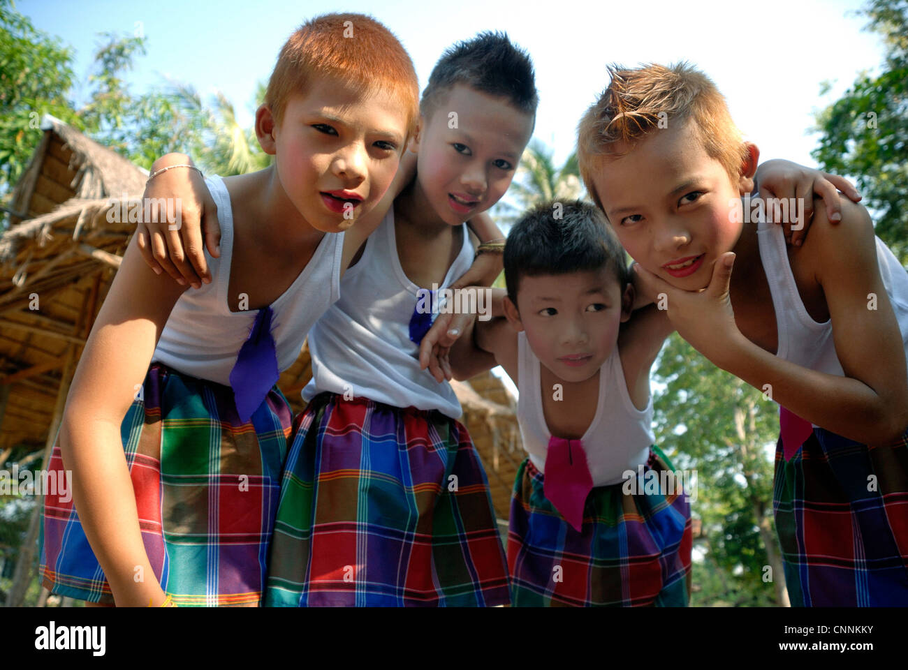 Young boys in issan costume songkhran festival Udonthani Stock Photo