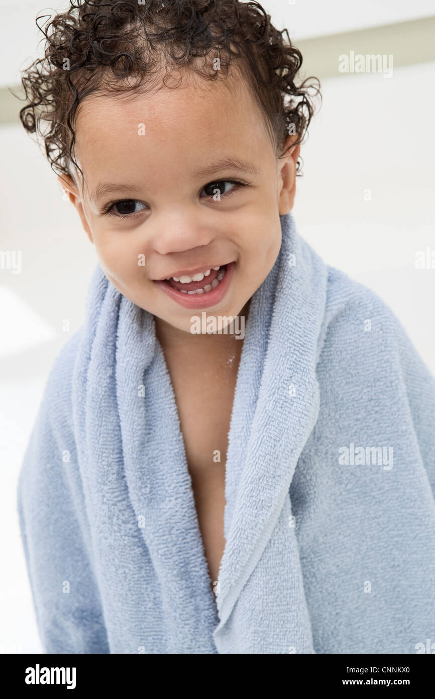 Boy Wrapped in Towel After Bath Stock Photo Alamy