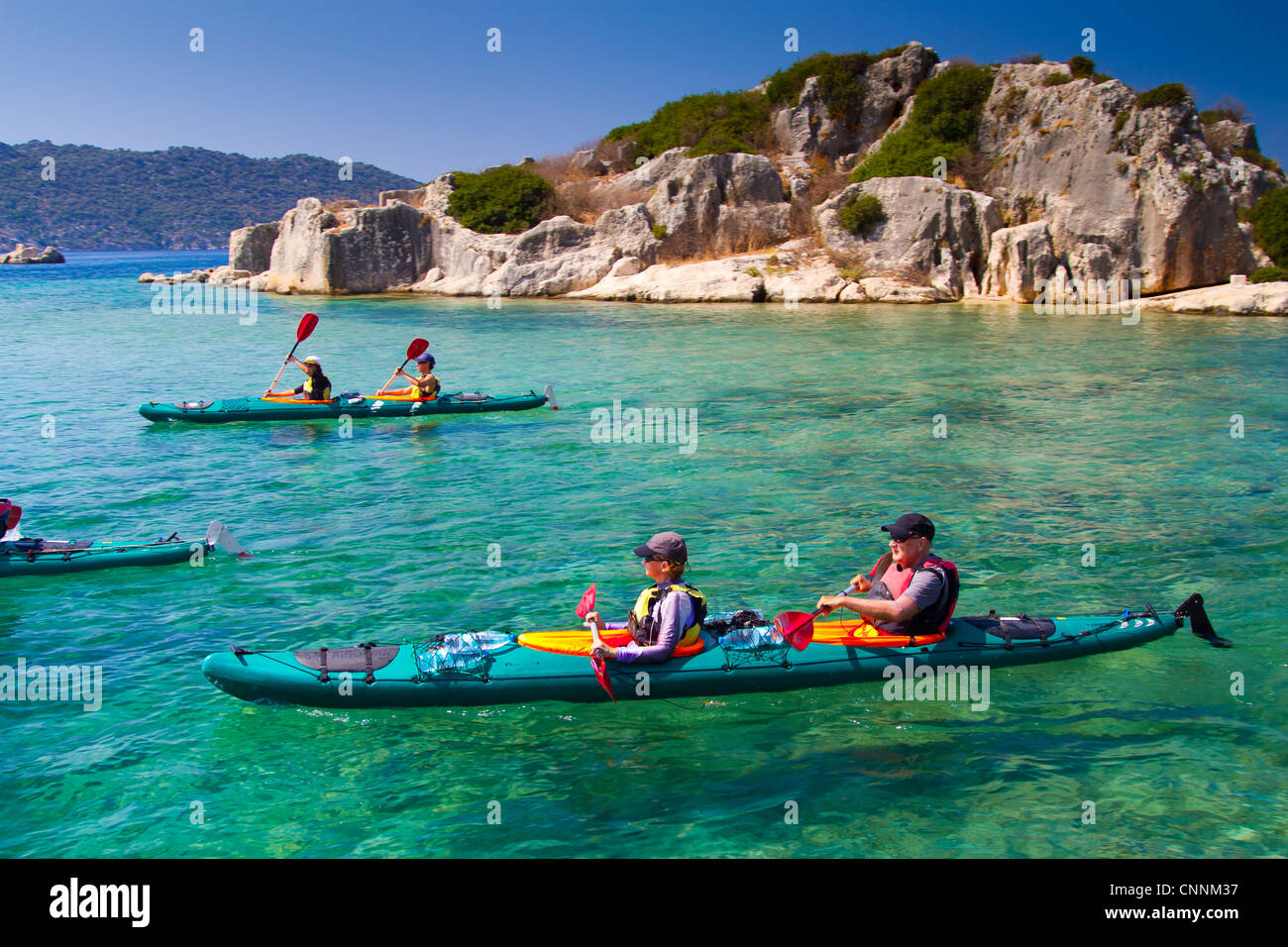 People and kayak. Kaleköy. Antalya province. Mediterranean coast. Turkey. Stock Photo