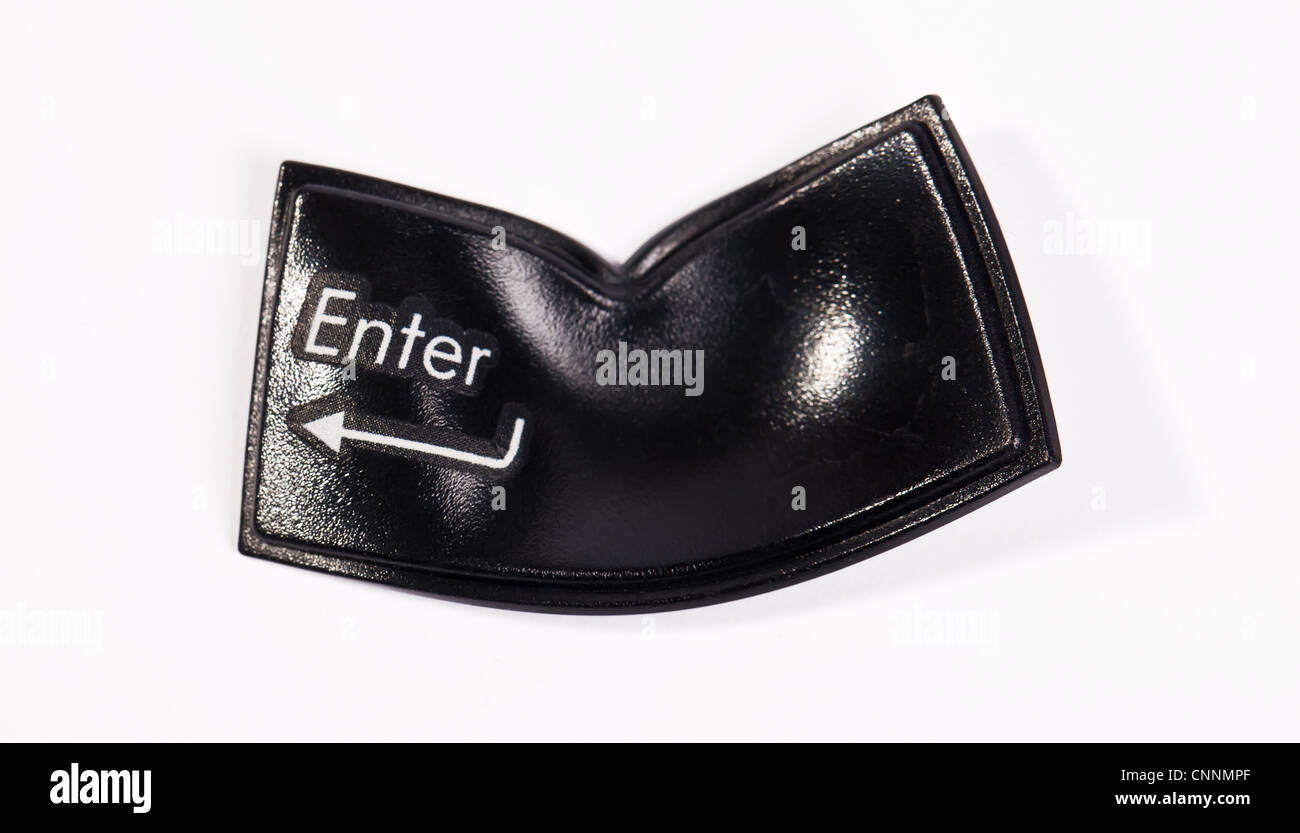 Black laptop key enter with arrow distorted and broken Stock Photo
