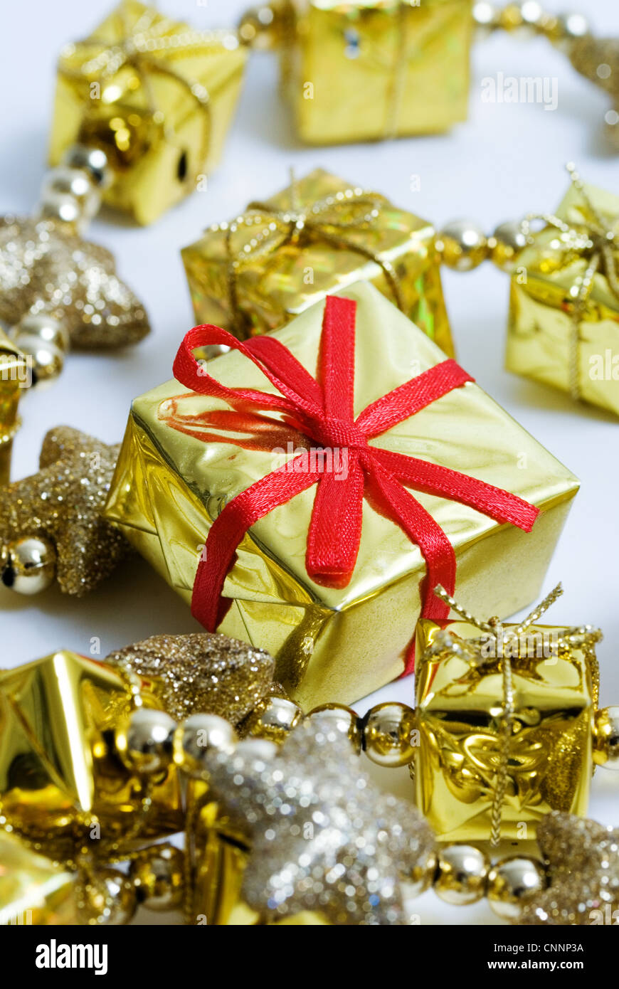 A Christmas tree ornament, string of gifts, Xmas theme Stock Photo
