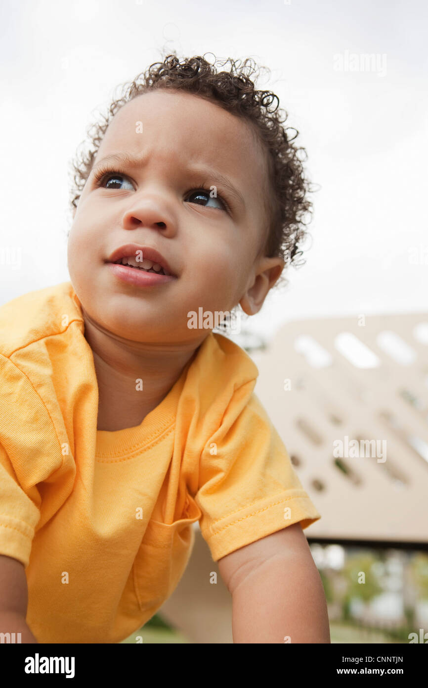 Close-up Portrait of Young Boy at Playground Stock Photo