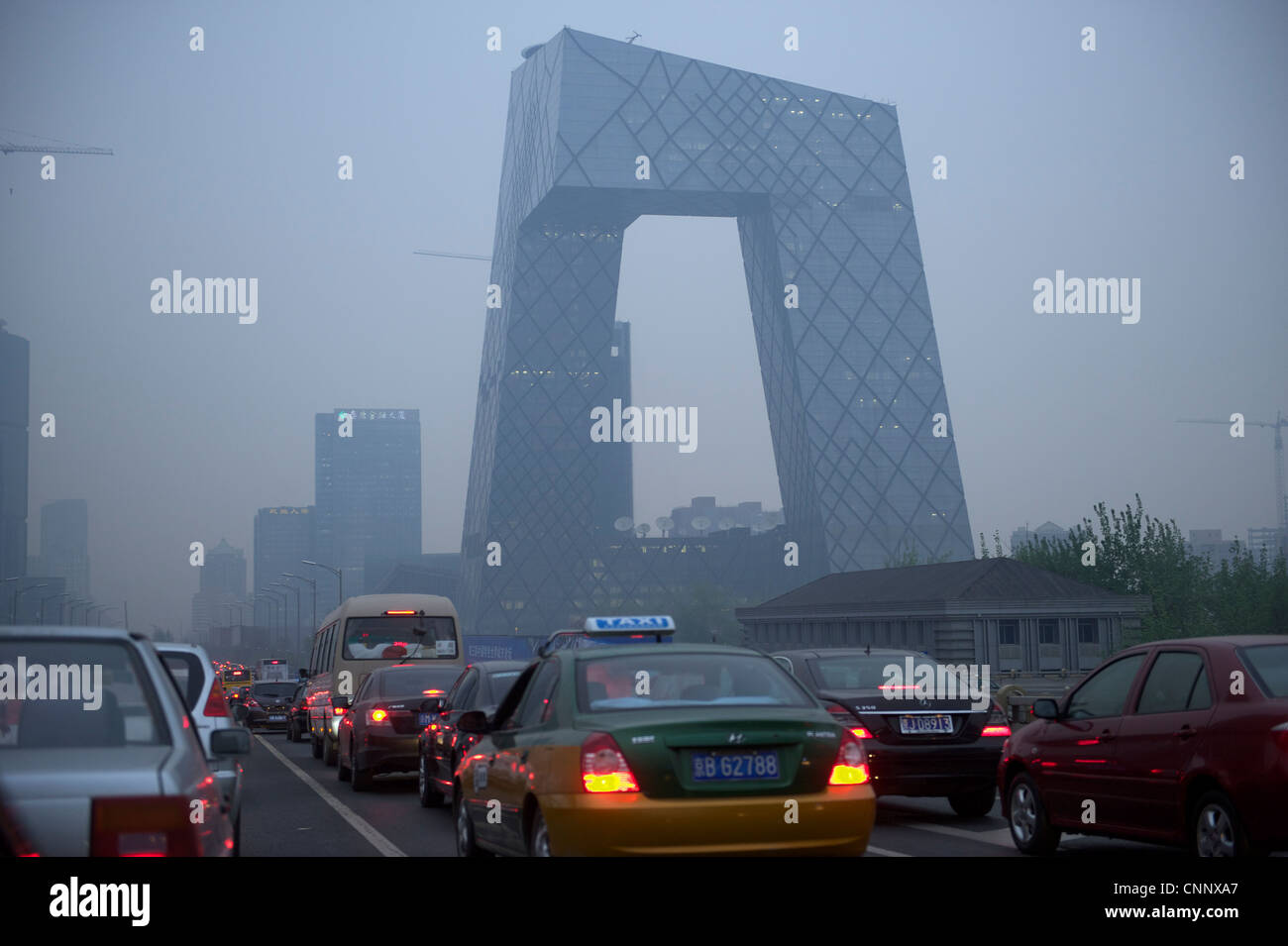 CCTV  new Headquarters amid haze in Beijing, China. 19-Apr-2012 Stock Photo