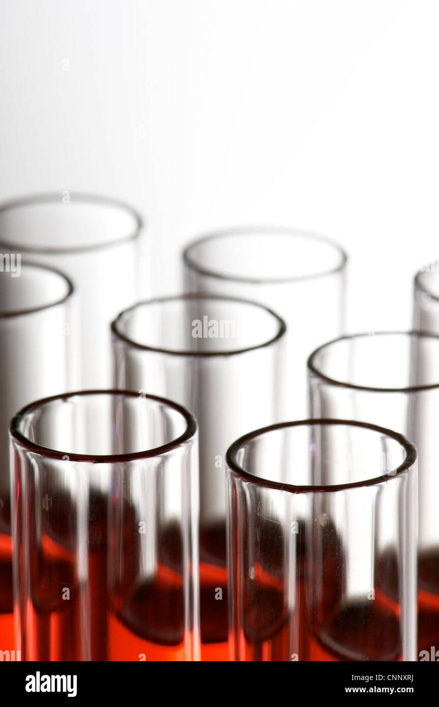 group of laboratory test tubes with red liquid inside Stock Photo - Alamy
