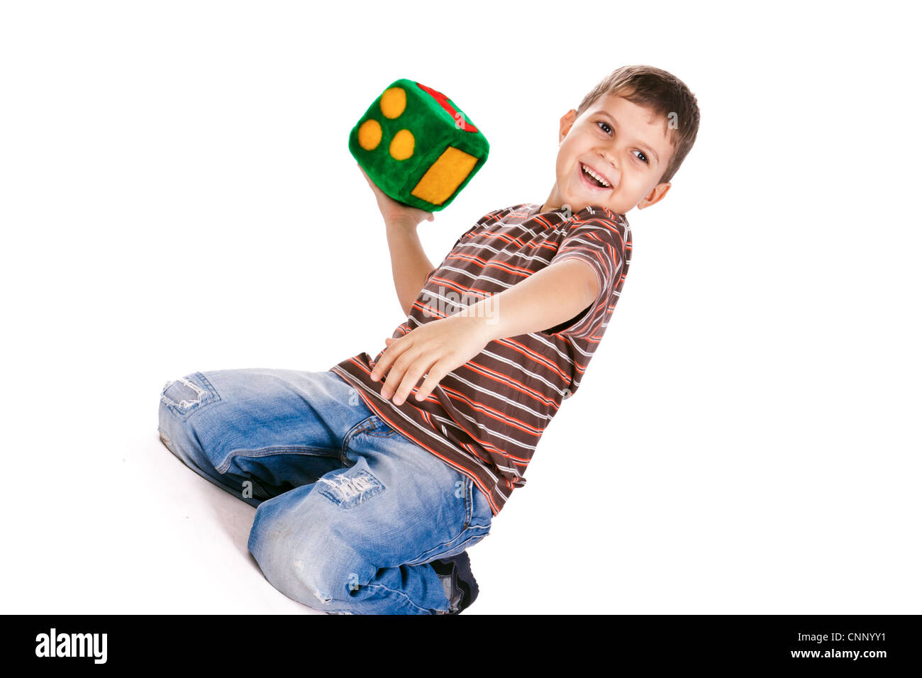 Happy kids throwing block with numbers over white background Stock
