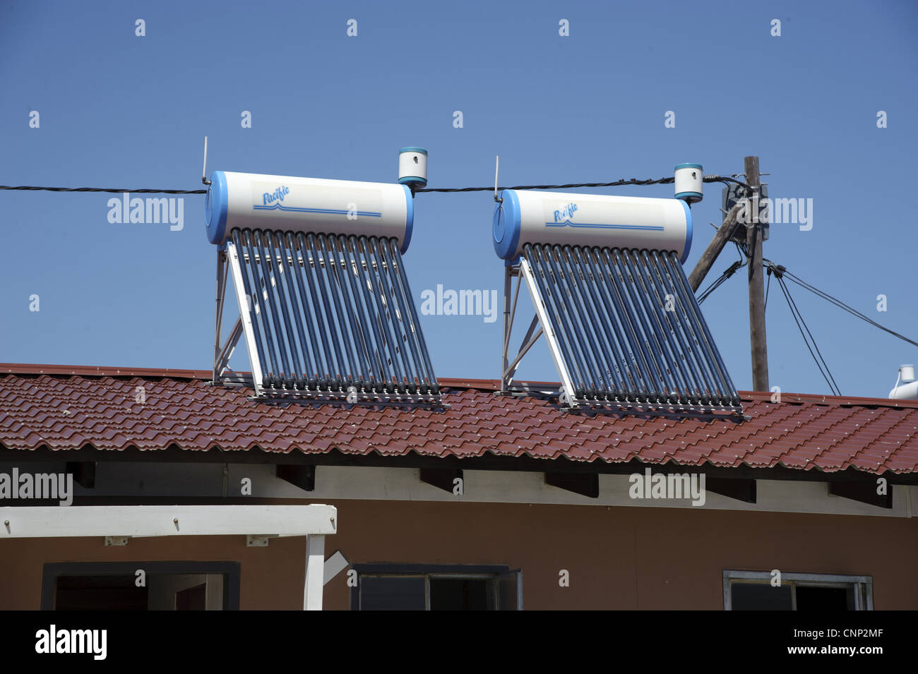 New housing with solar water heating on roof, Langa Township, Cape Town, Western Cape, South Africa Stock Photo