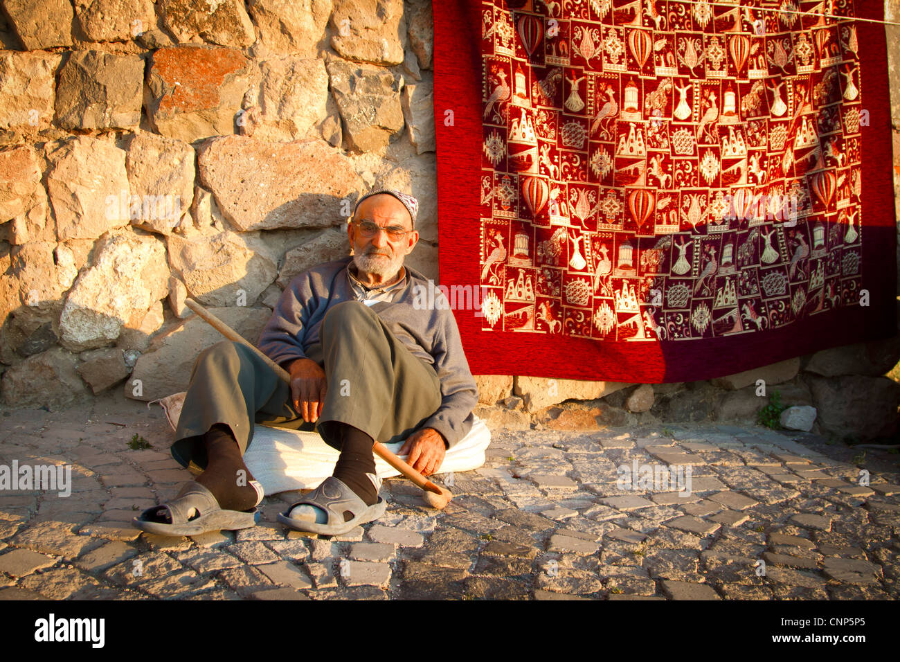 Old carpet seller Stock Photo Alamy