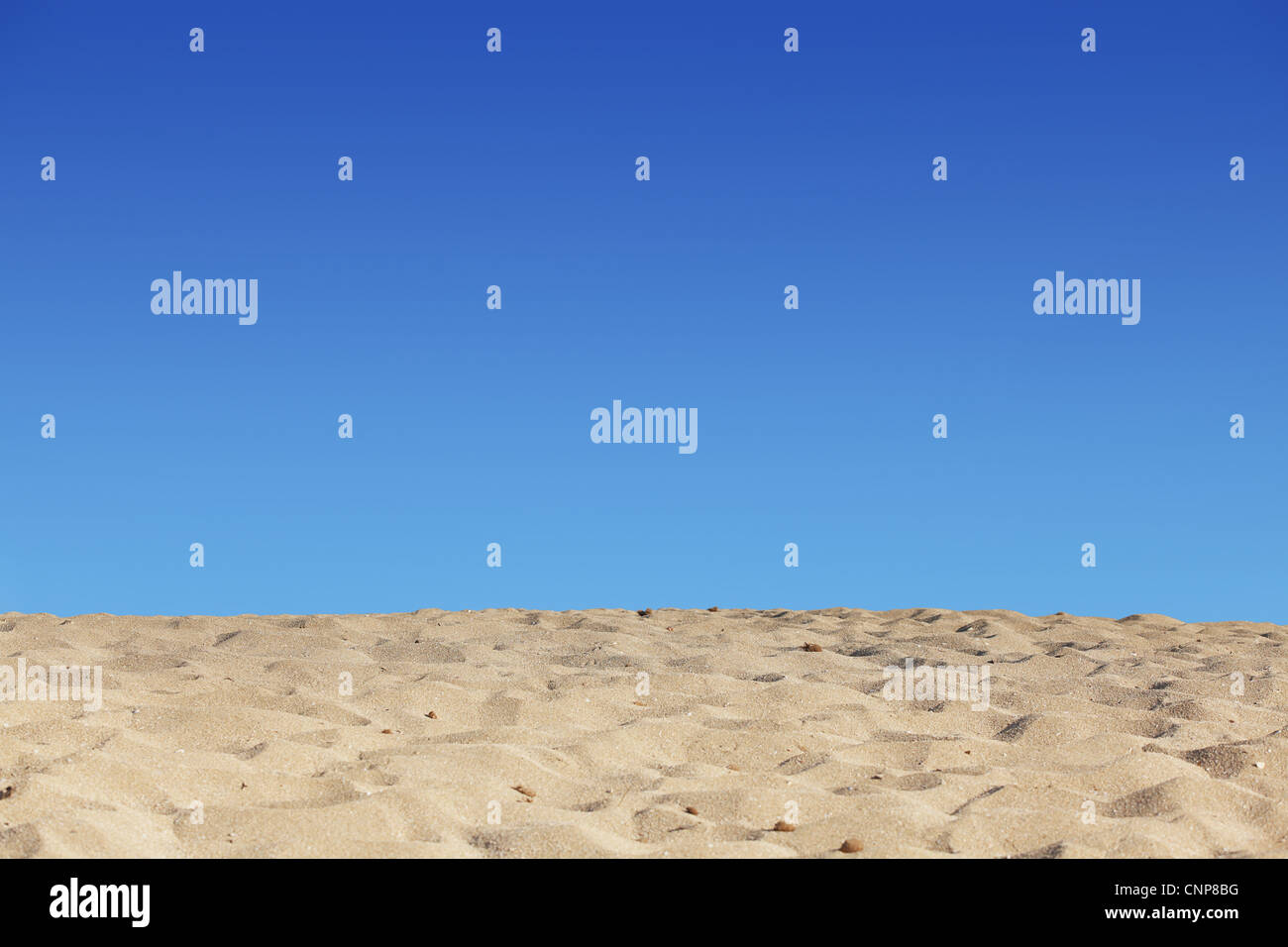 beach blue sky and sand background Stock Photo - Alamy