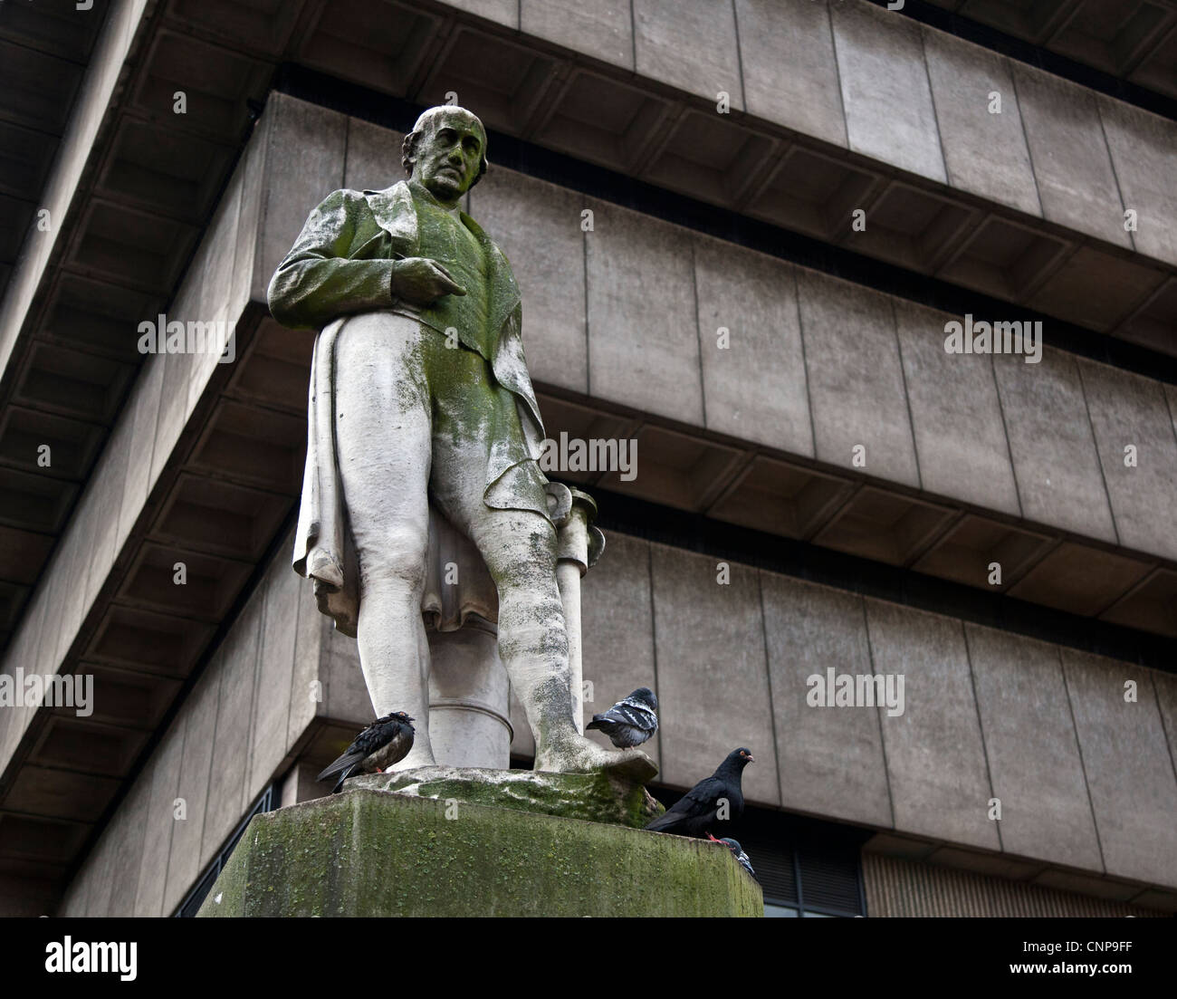 A statue of the engineer James Watt stands against the backdrop of the