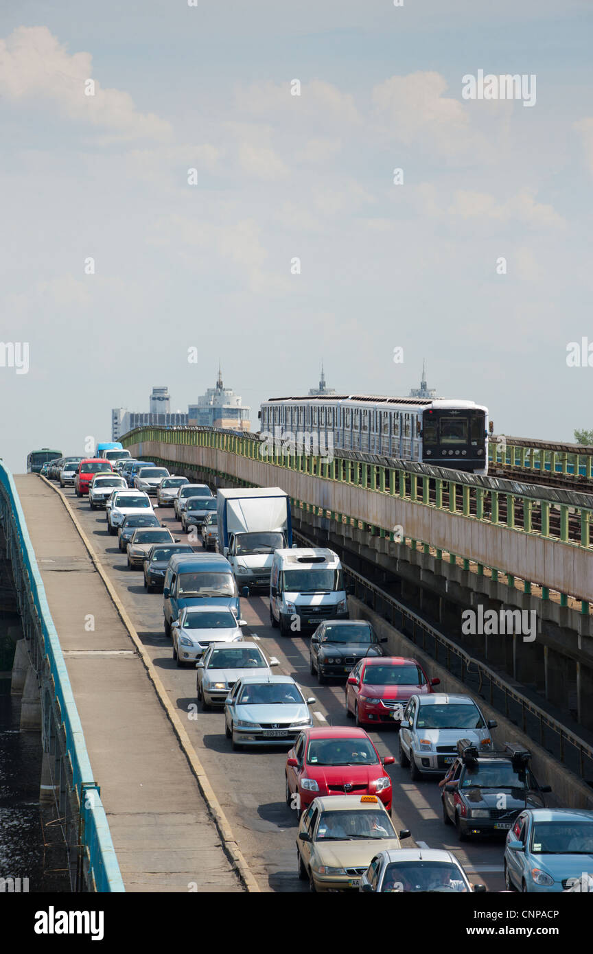 Traffic on the Metro Bridge, Mist Metro, over the Dnieper RiverKiev, Ukraine, Europe. Stock Photo