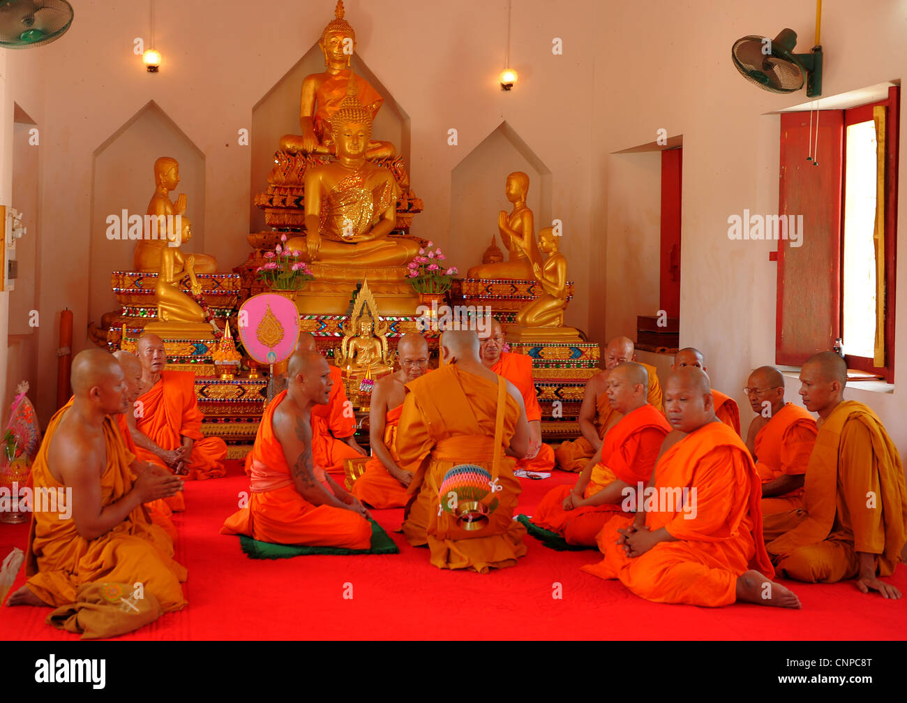 monks praying , monk ordination ceremony ,wat pong pang ,buddhist